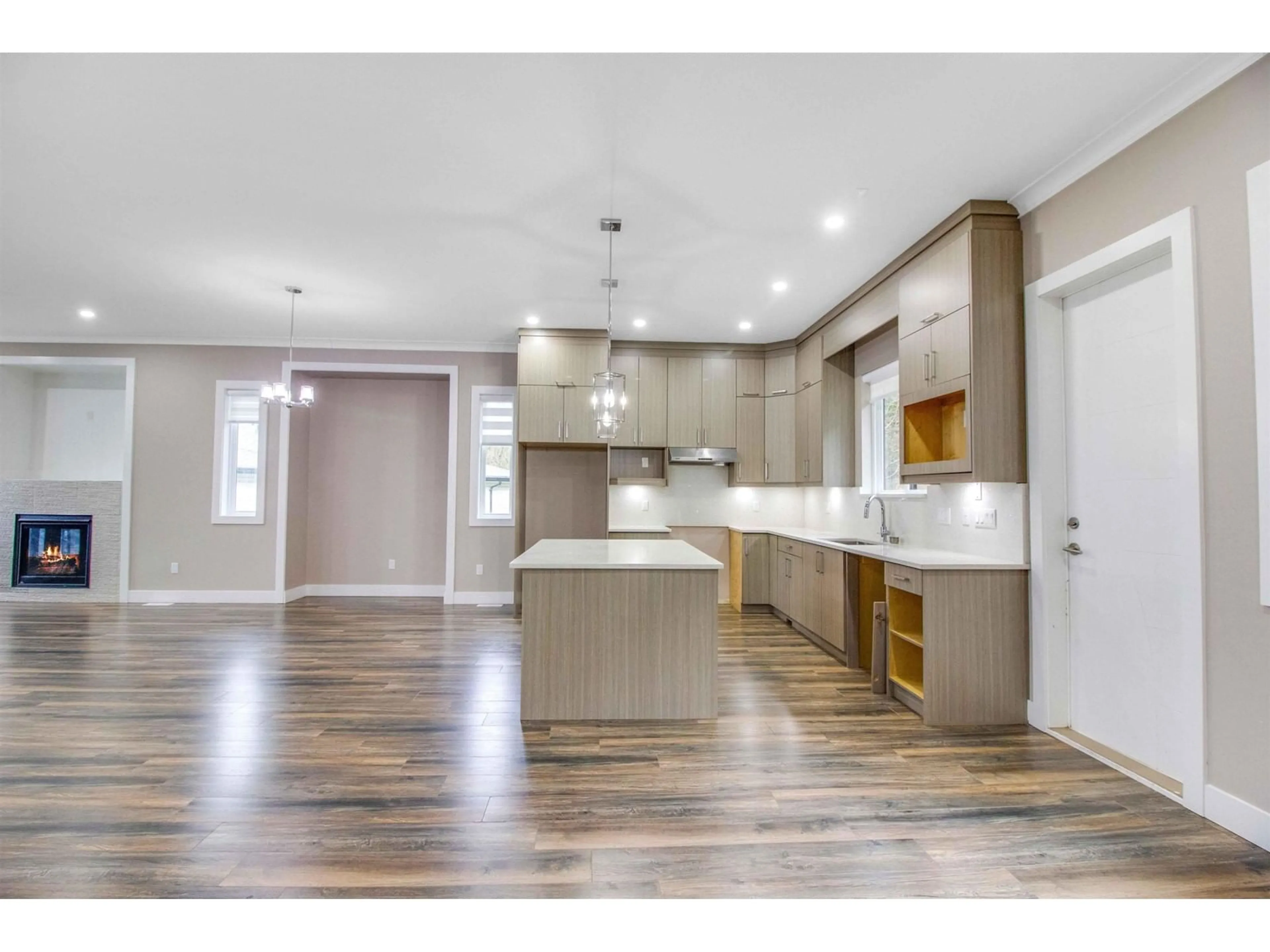 Open concept kitchen, wood/laminate floor for 8210 HARVEST PLACE, Chilliwack British Columbia V4Z0E4