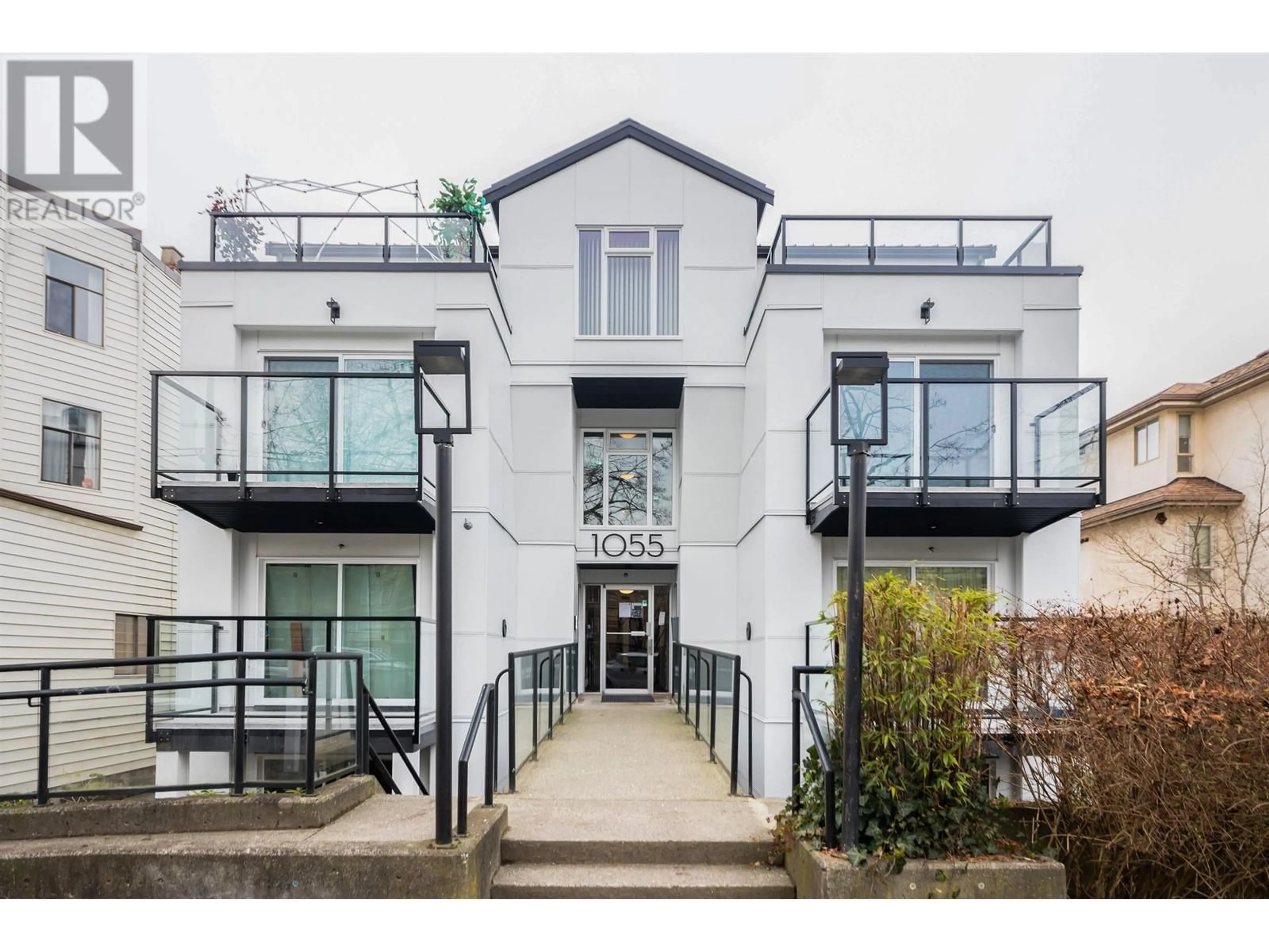 A pic from outside/outdoor area/front of a property/back of a property/a pic from drone, building for 104 - 1055 BROADWAY, Vancouver British Columbia V5T1Y5