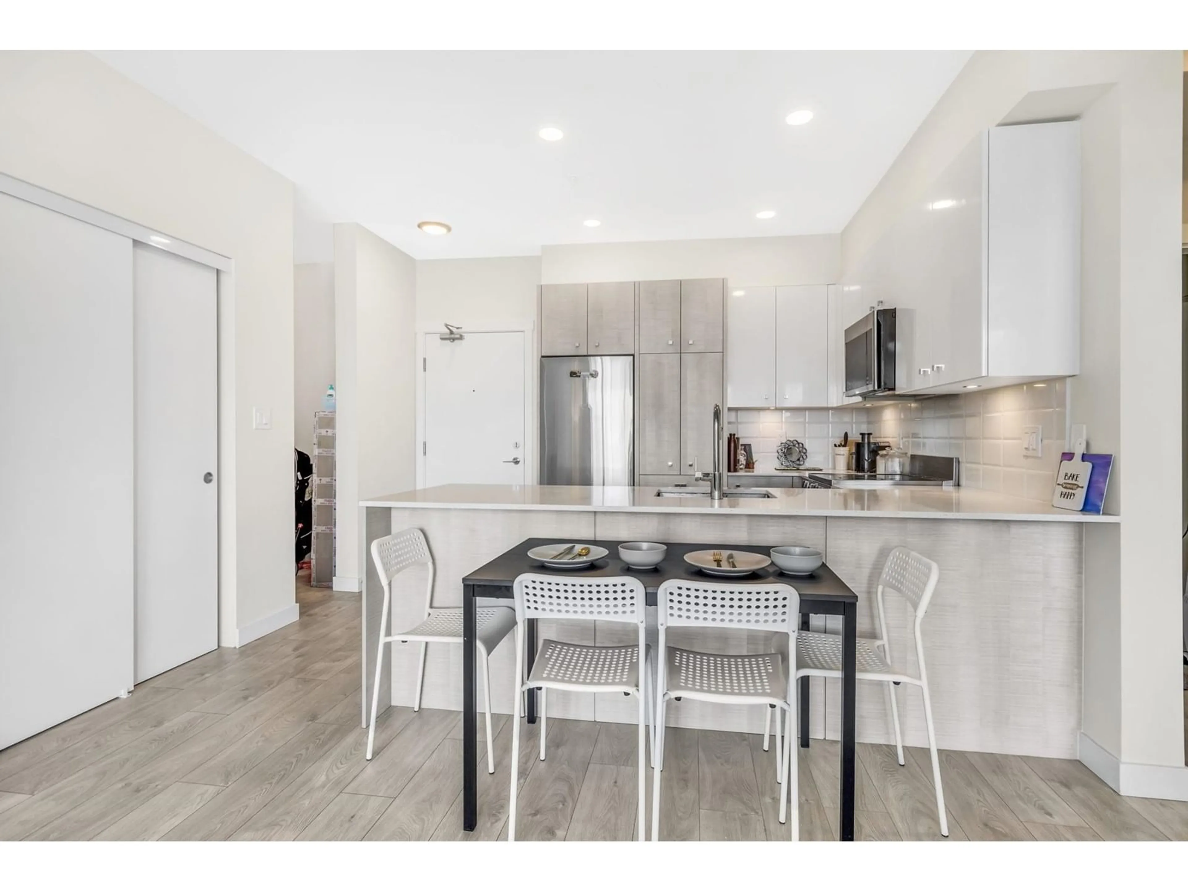 Open concept kitchen, unknown for 202 10838 WHALLEY BOULEVARD, Surrey British Columbia V3R0G8