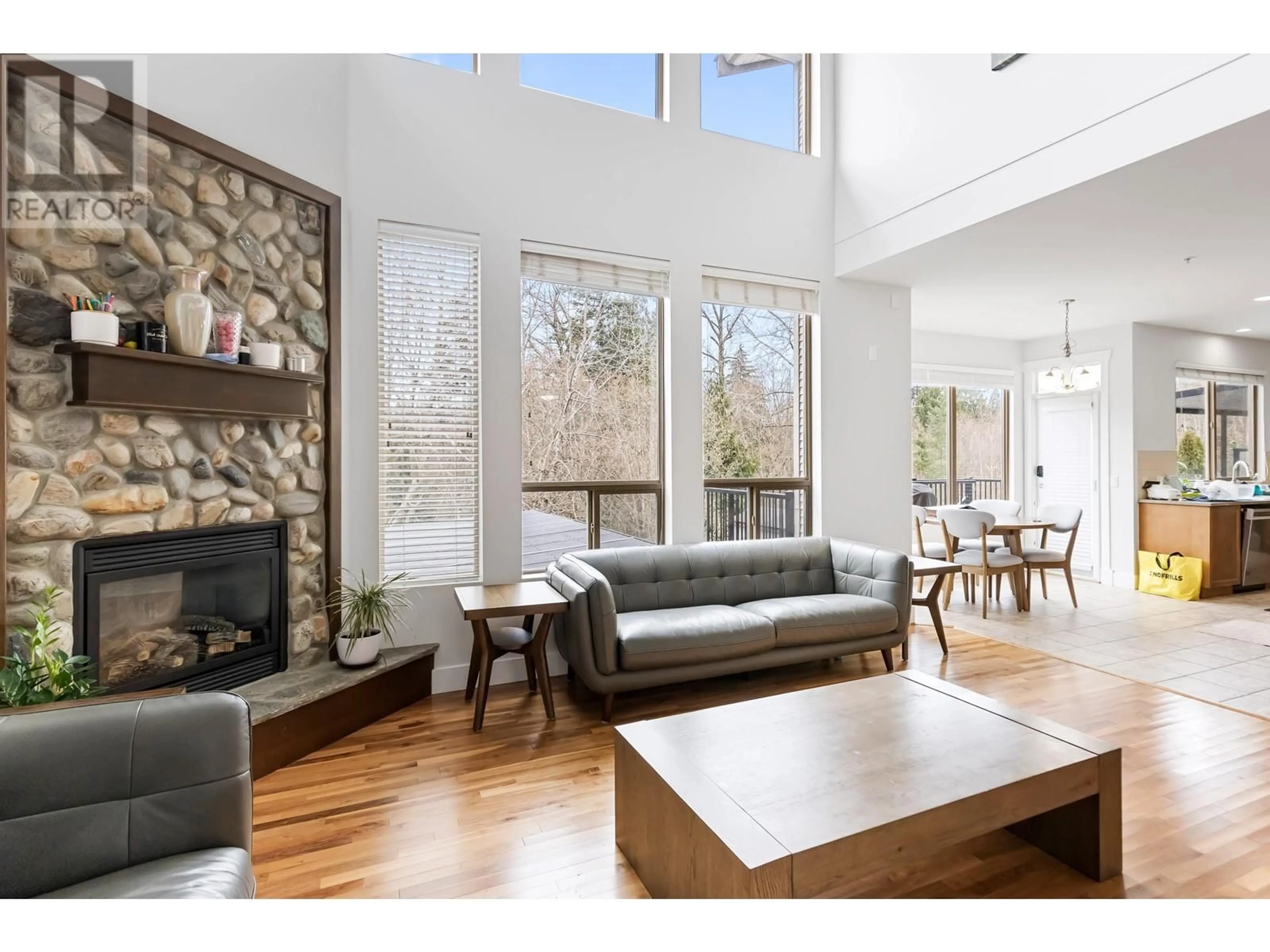 Living room with furniture, wood/laminate floor for 24763 MCCLURE DRIVE, Maple Ridge British Columbia V2W0A5