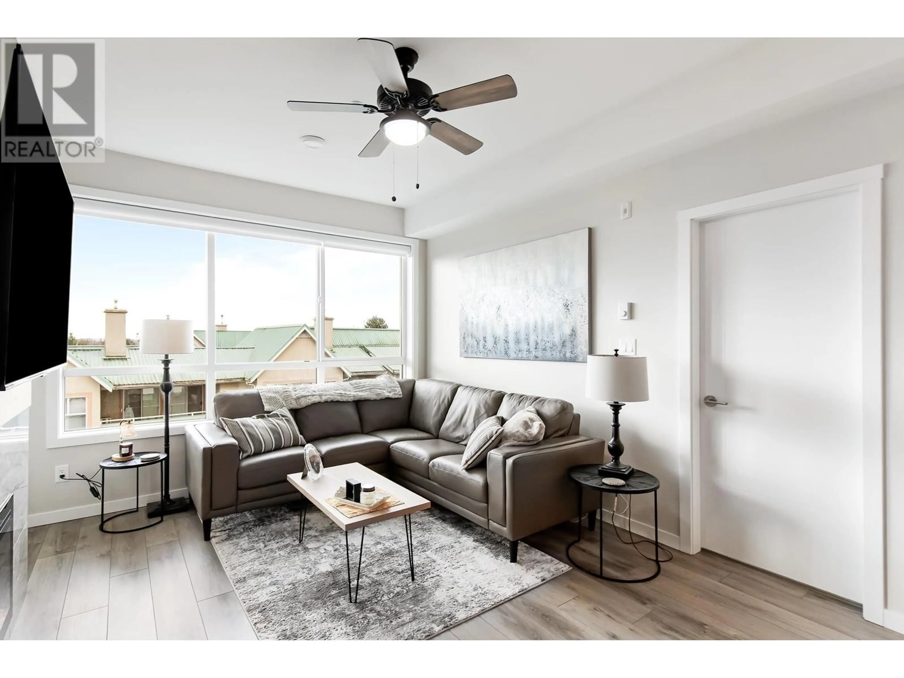 Living room with furniture, wood/laminate floor for 407 - 11641 227 STREET, Maple Ridge British Columbia V2X9J6