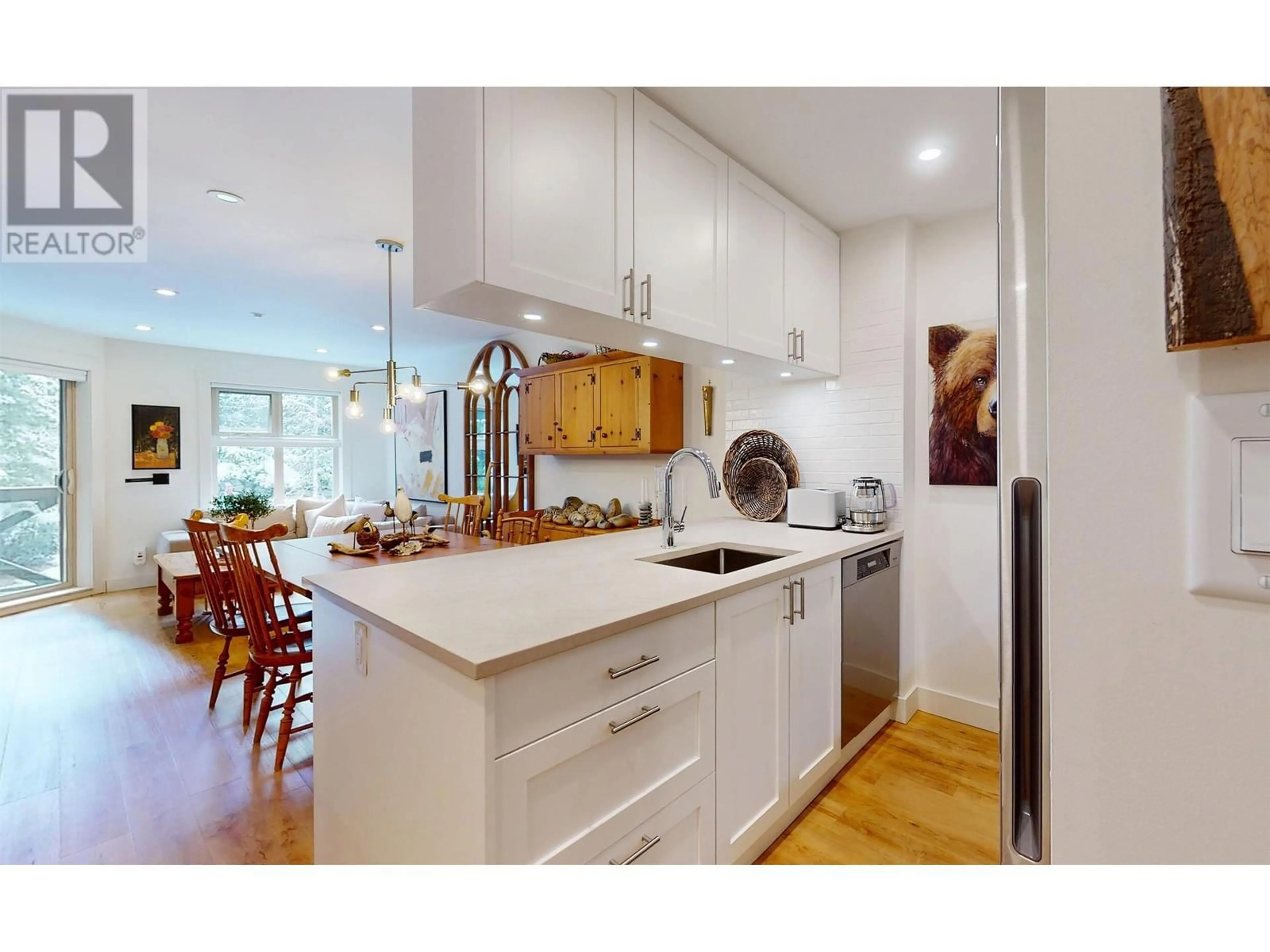 Contemporary kitchen, wood/laminate floor for 421 - 4660 BLACKCOMB WAY, Whistler British Columbia V8E0Y8