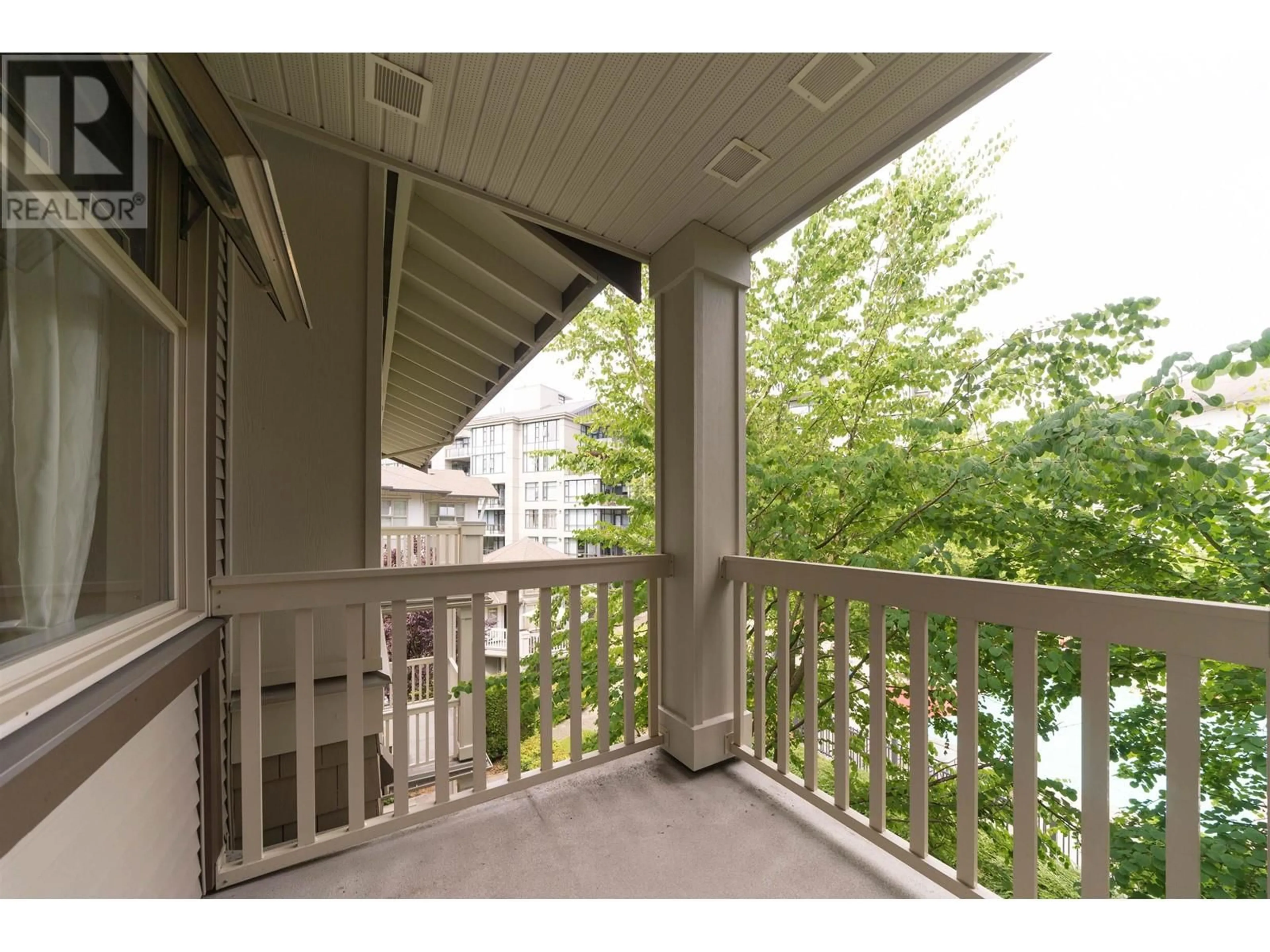 Balcony in the apartment, city buildings view from balcony for 320 - 2083 33RD AVENUE, Vancouver British Columbia V6M4M6