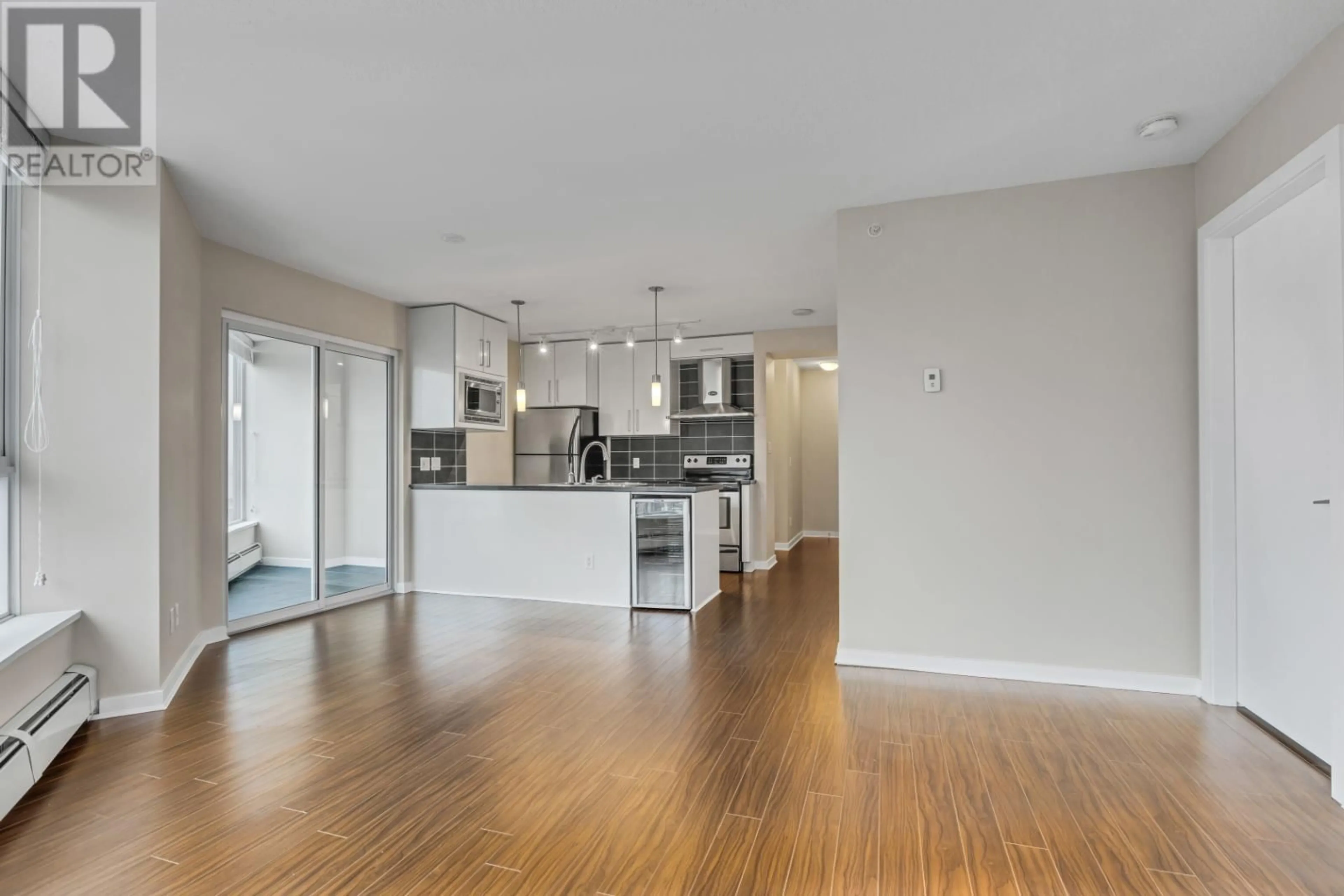 Open concept kitchen, wood/laminate floor for 3201 689 ABBOTT STREET, Vancouver British Columbia V6B0J2