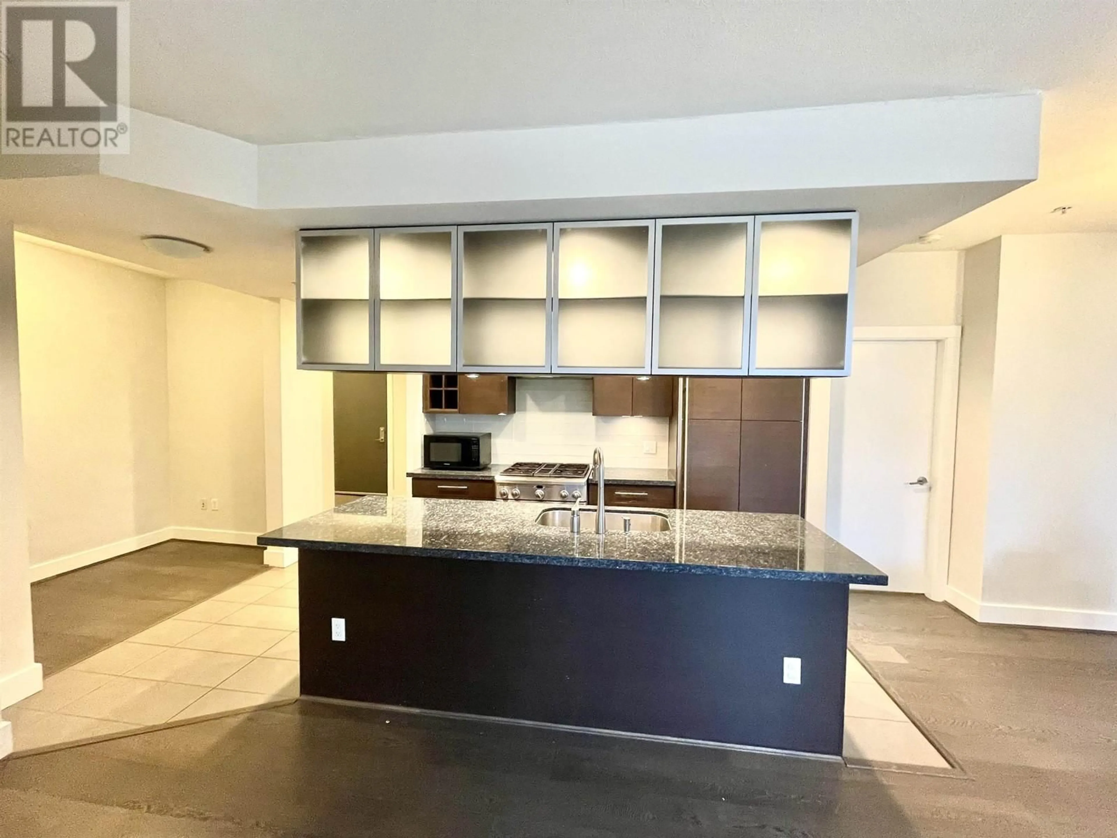 Open concept kitchen, ceramic/tile floor for 106 - 5928 BIRNEY AVENUE, Vancouver British Columbia V6S0B5