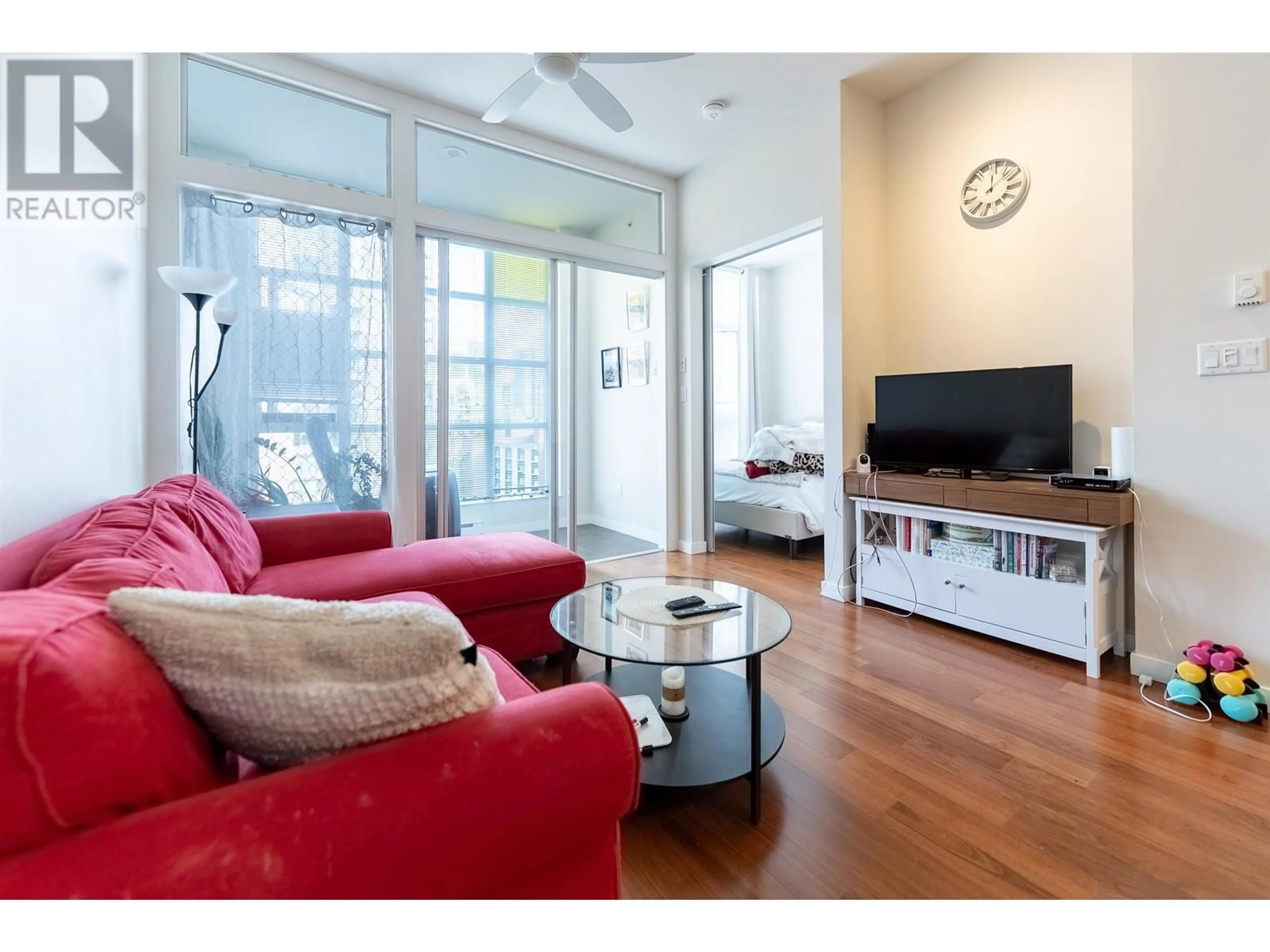 Living room with furniture, wood/laminate floor for 1002 1205 HOWE STREET, Vancouver British Columbia V6Z0B2