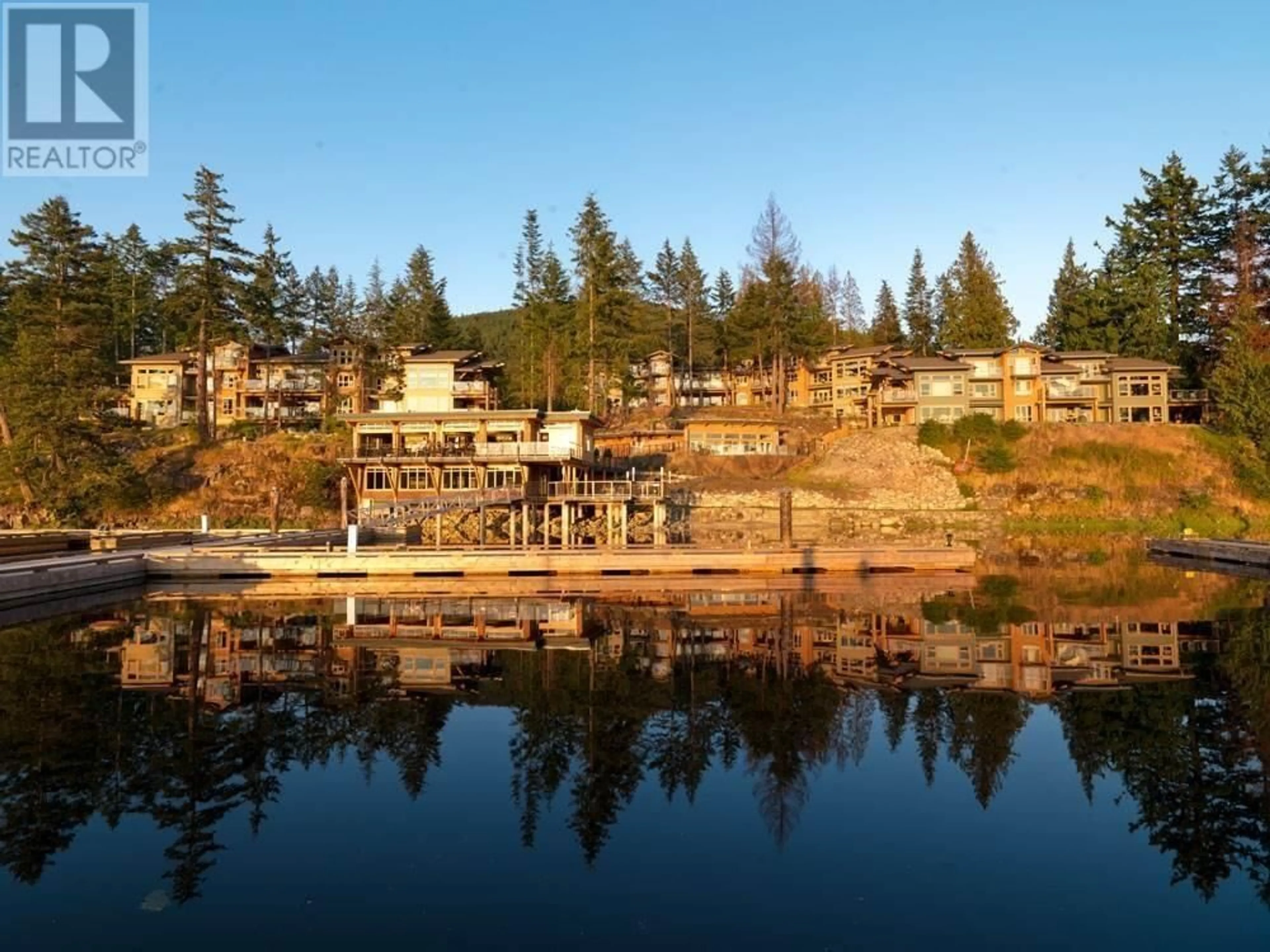 A pic from outside/outdoor area/front of a property/back of a property/a pic from drone, water/lake/river/ocean view for 21A - 12849 LAGOON ROAD, Madeira Park British Columbia V0N2H1