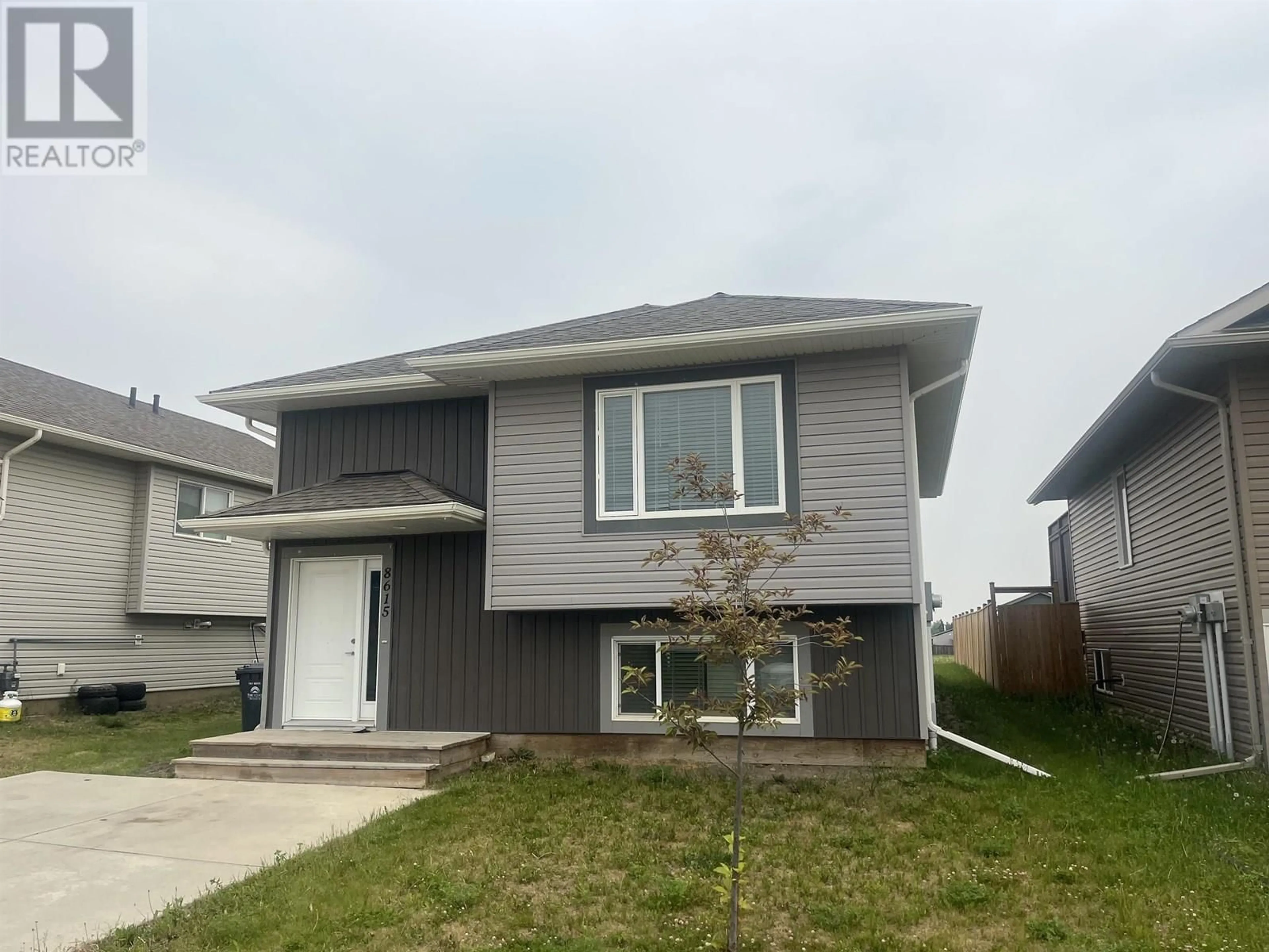 Home with vinyl exterior material, street for 8615 81A STREET, Fort St. John British Columbia V1J0M5