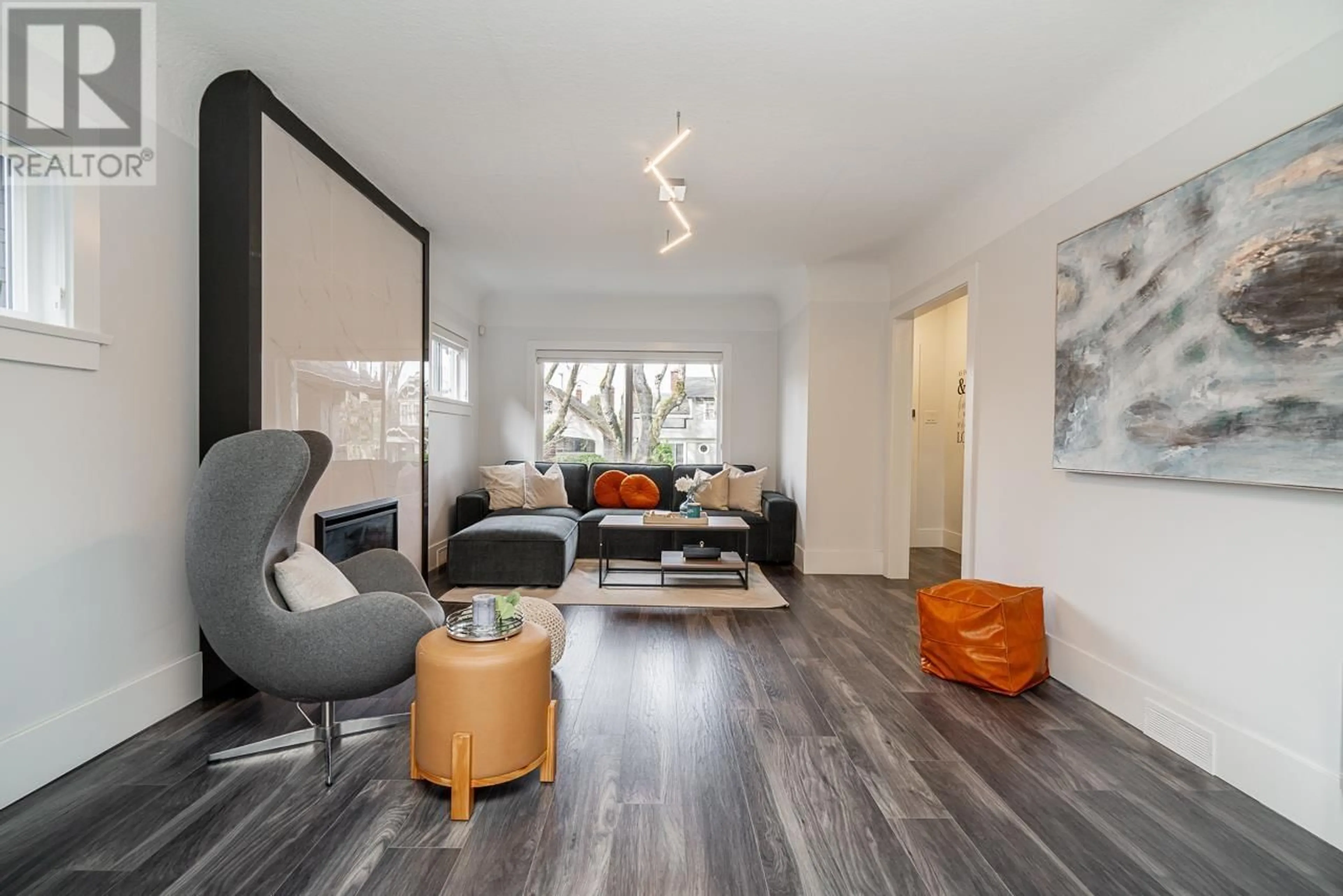 Living room with furniture, wood/laminate floor for 948 22ND AVENUE, Vancouver British Columbia V5Z2A1