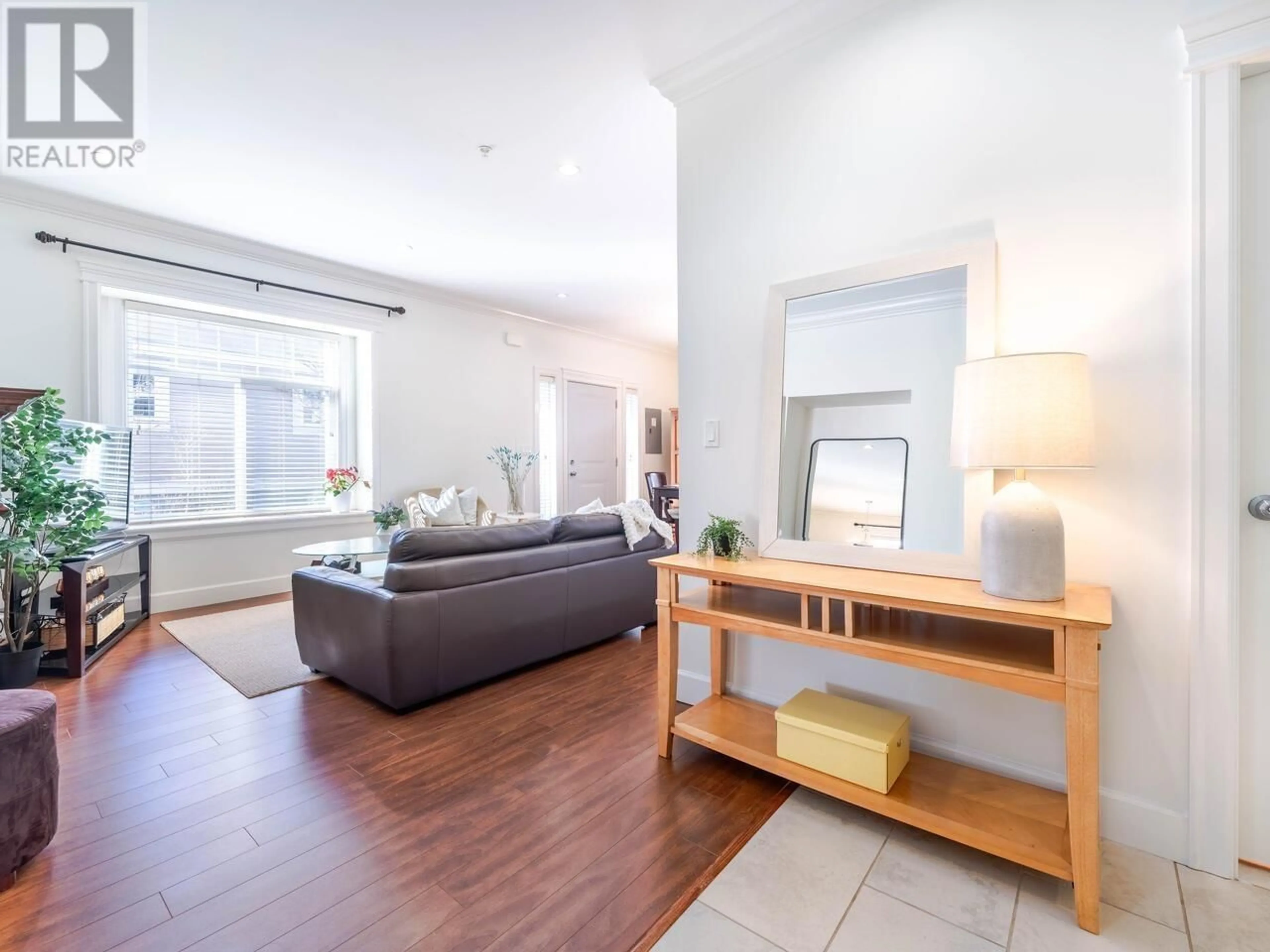 Living room with furniture, wood/laminate floor for 2422 TRIUMPH STREET, Vancouver British Columbia V5K1S5