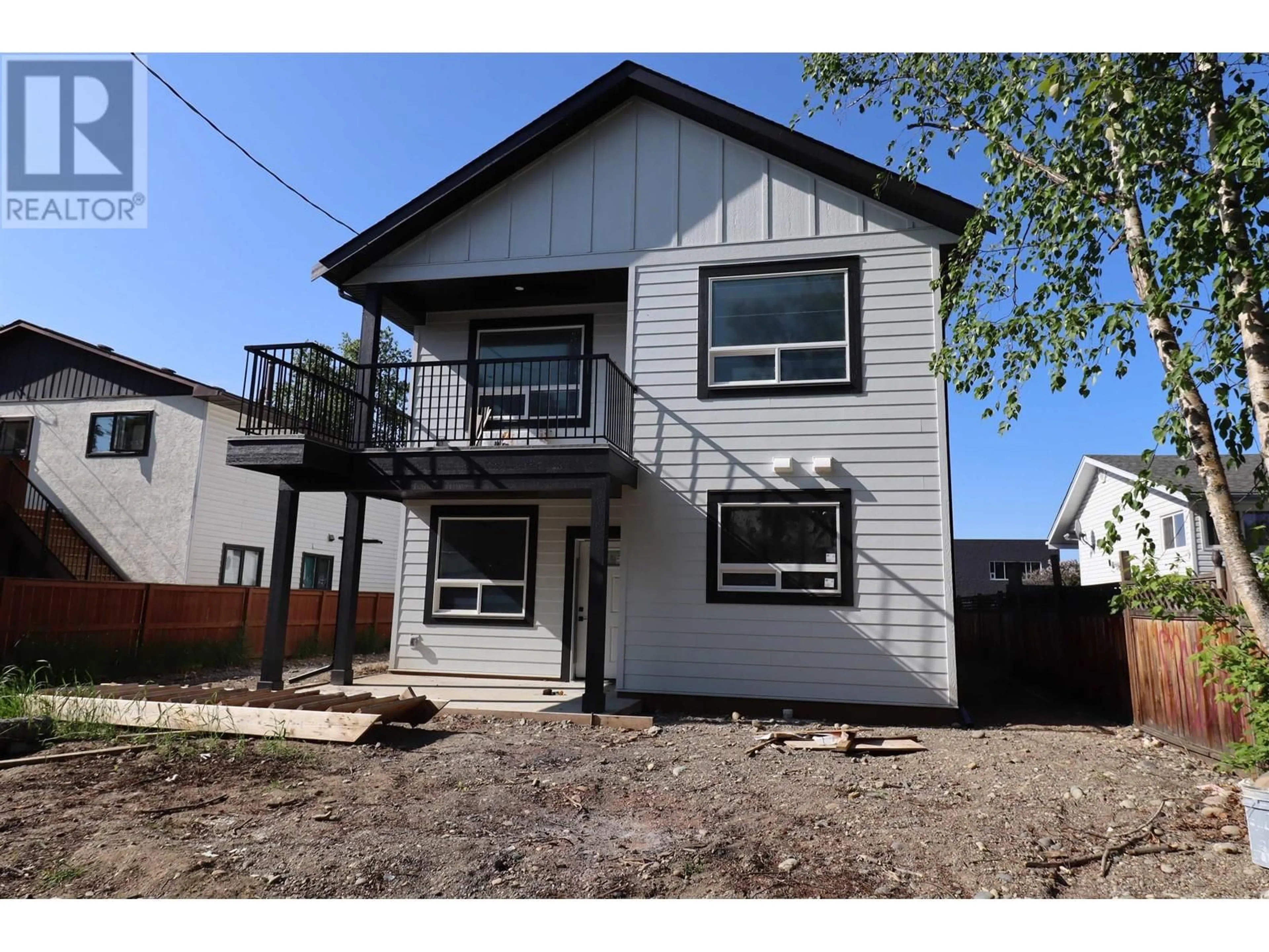 Home with vinyl exterior material, street for 1850 6TH AVENUE, Prince George British Columbia V2M1L6