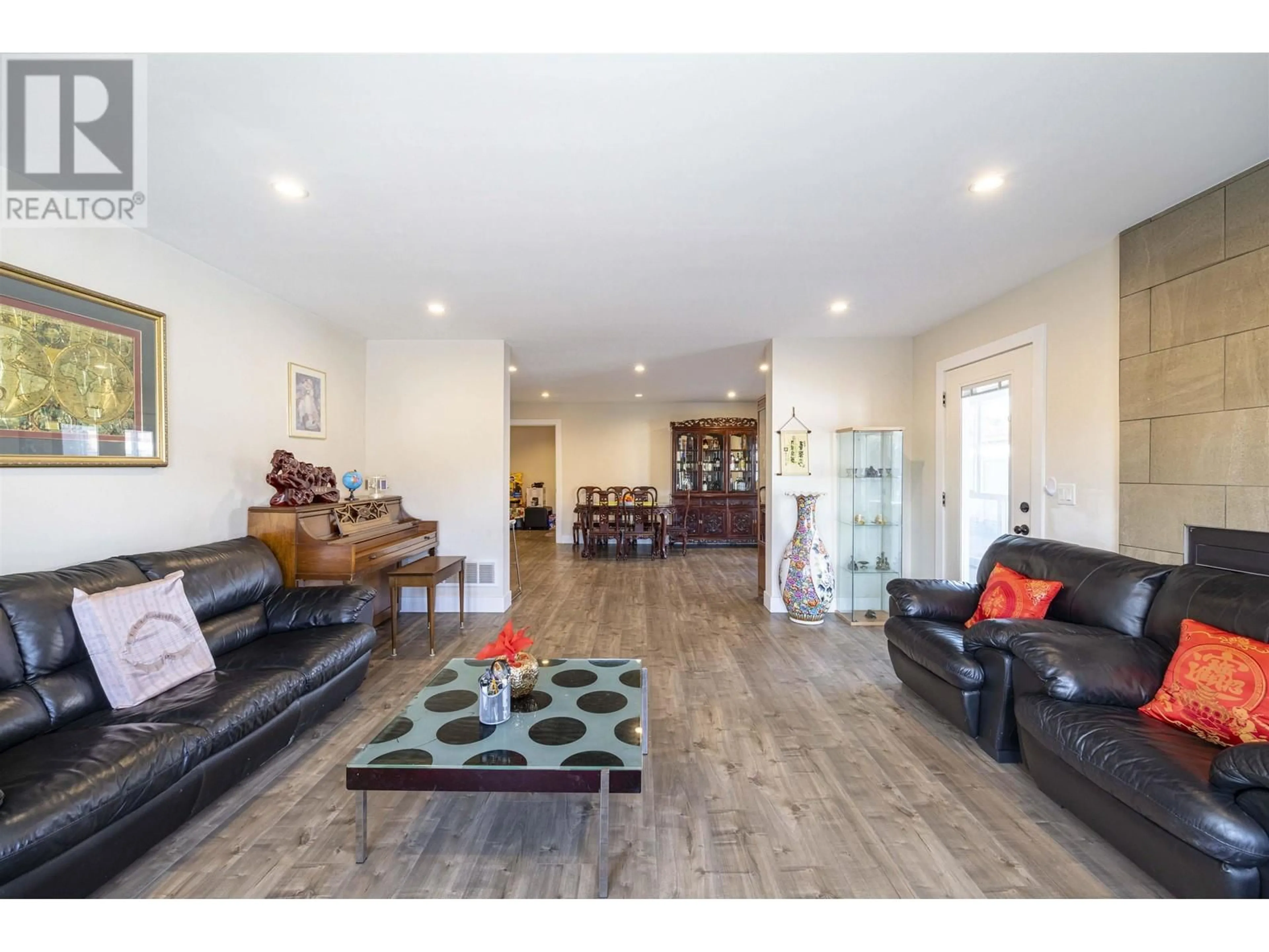 Living room with furniture, wood/laminate floor for 7535 BURGESS STREET, Burnaby British Columbia V3N3H9