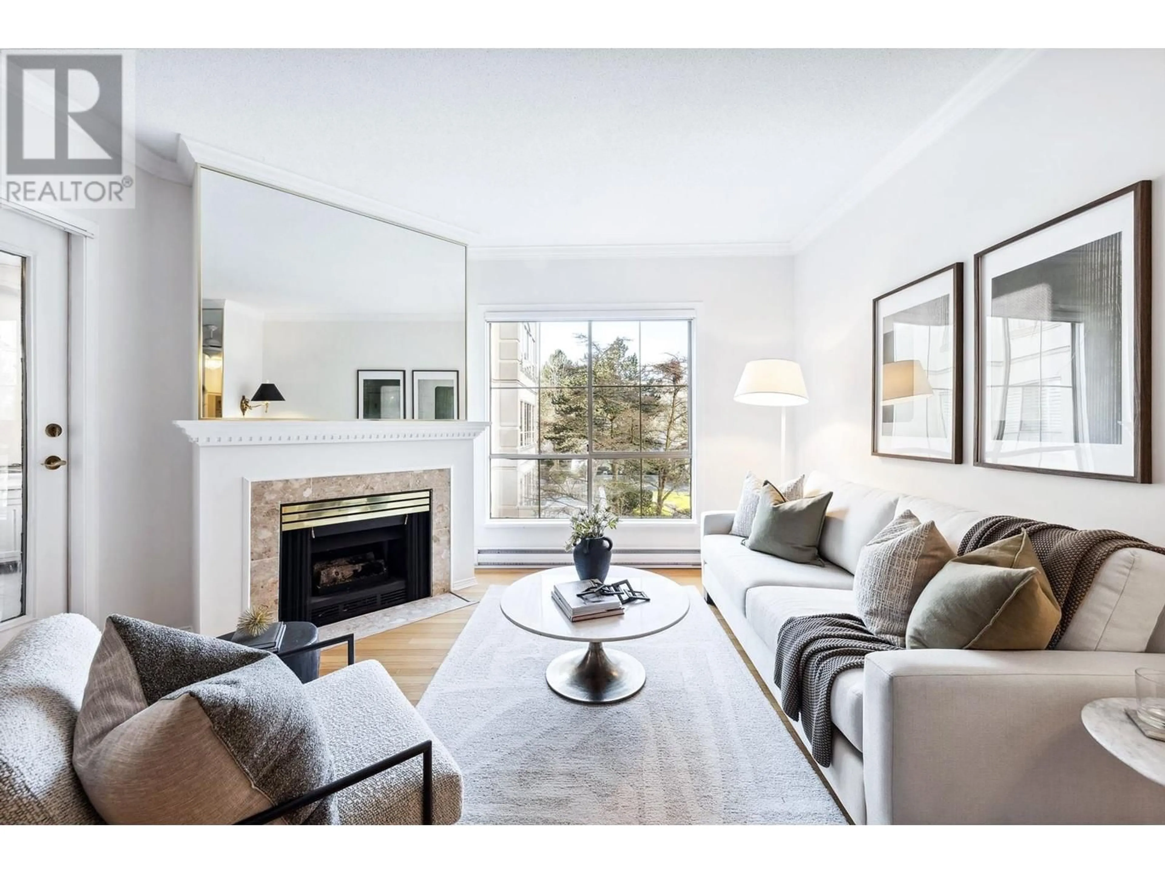 Living room with furniture, wood/laminate floor for 214 - 8580 GENERAL CURRIE ROAD, Richmond British Columbia V6Y3V5