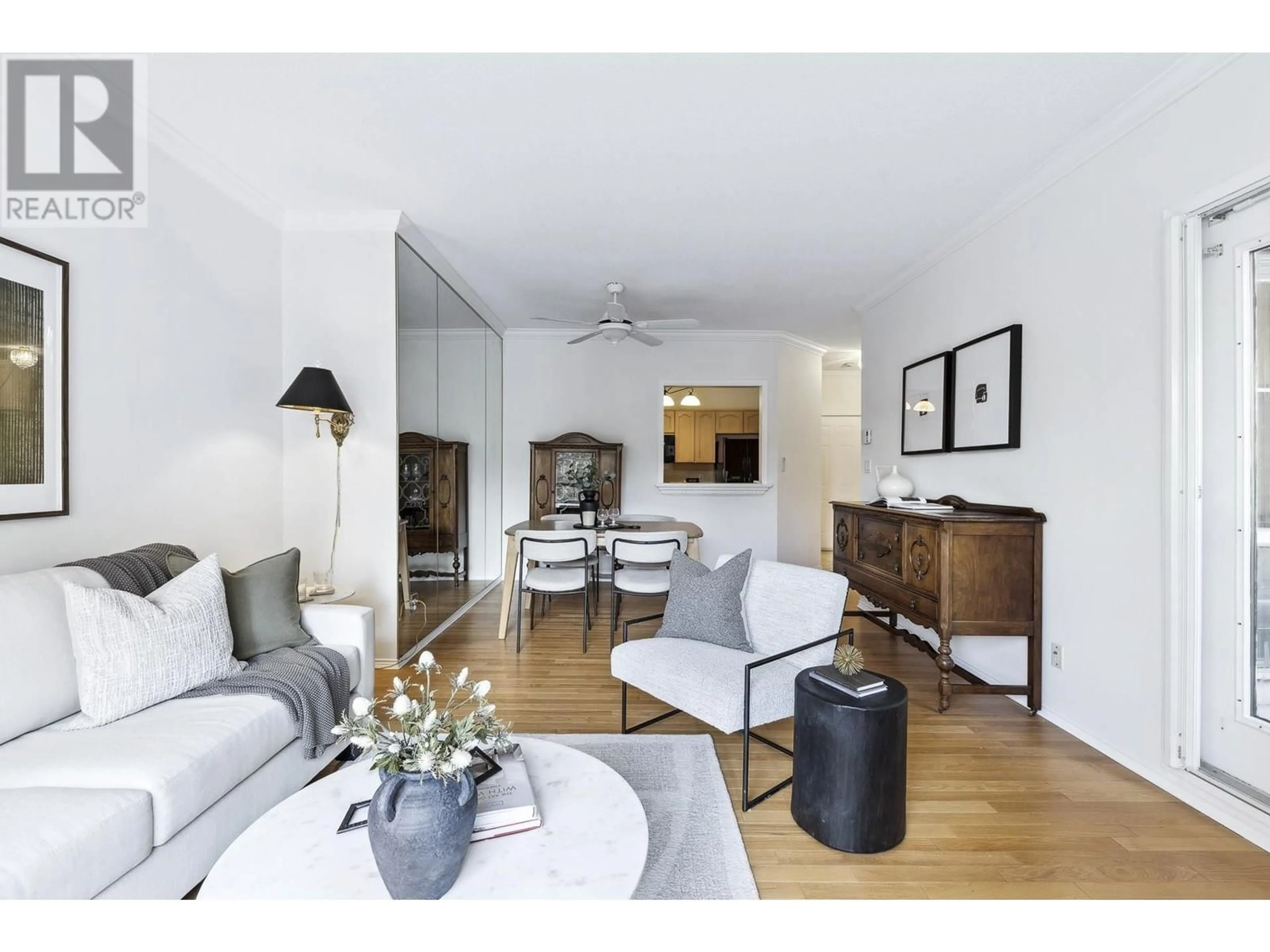 Living room with furniture, wood/laminate floor for 214 - 8580 GENERAL CURRIE ROAD, Richmond British Columbia V6Y3V5