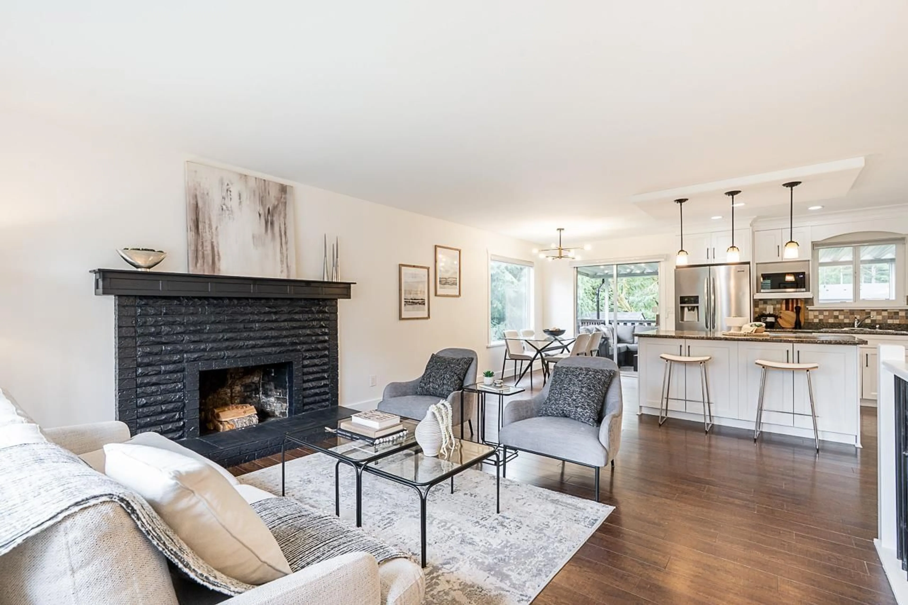 Living room with furniture, wood/laminate floor for 4169 205A, Langley British Columbia V3A2A4