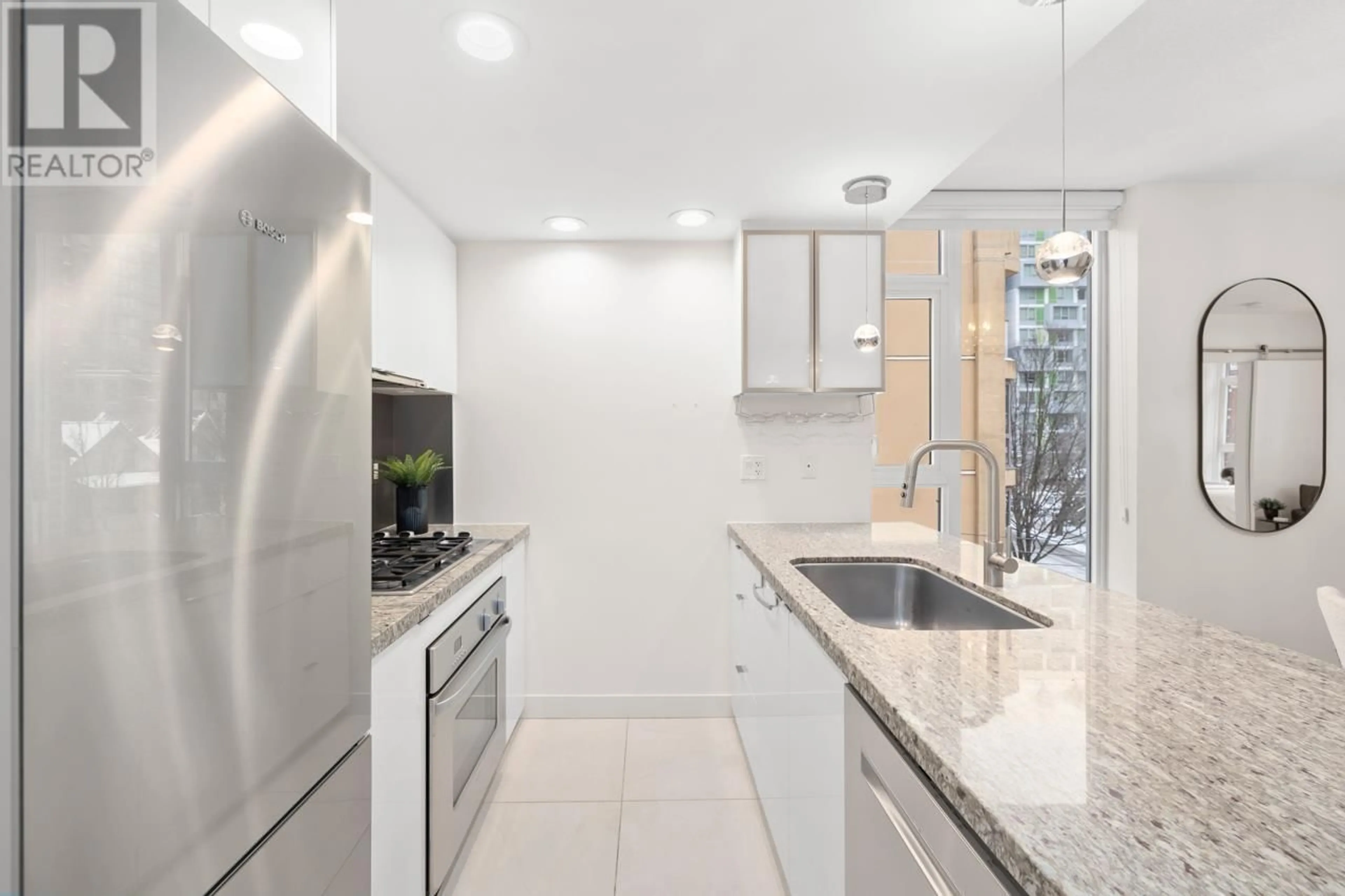 Contemporary kitchen, ceramic/tile floor for 406 - 1133 HOMER STREET, Vancouver British Columbia V6B0B1
