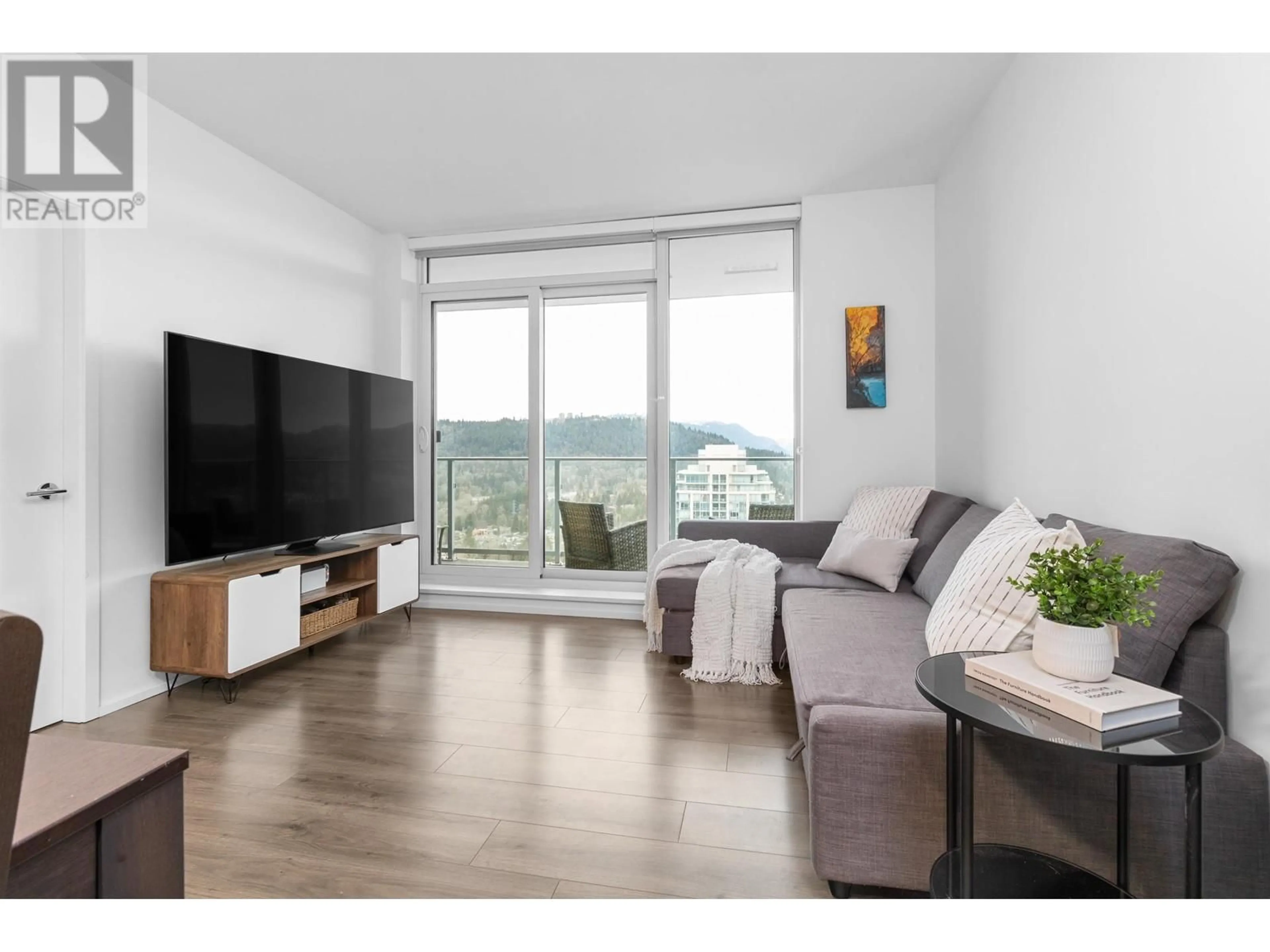 Living room with furniture, wood/laminate floor for 3511 - 3809 EVERGREEN PLACE, Burnaby British Columbia V3J0M1