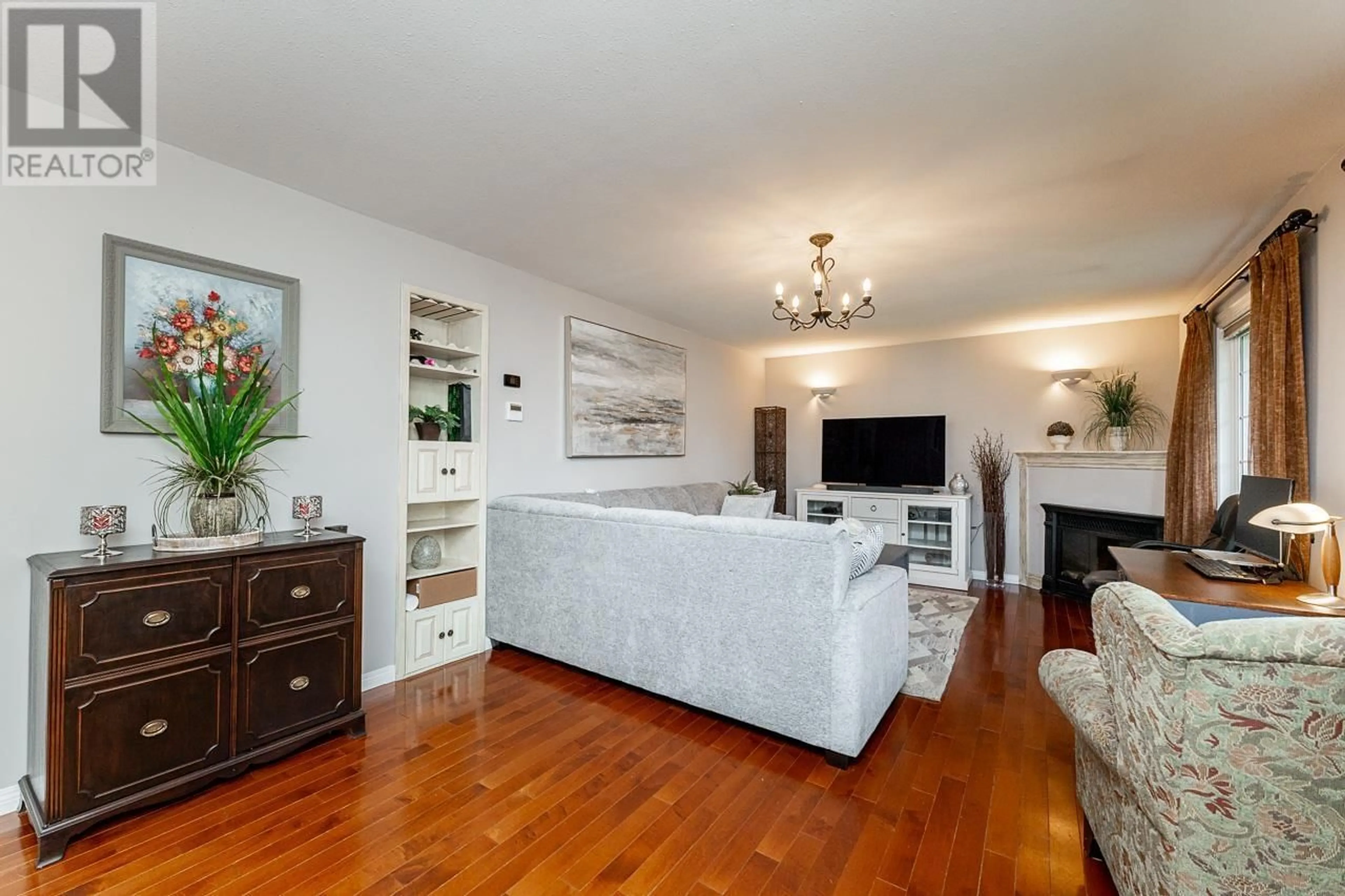 Living room with furniture, wood/laminate floor for 12195 227 STREET, Maple Ridge British Columbia V2X6J6