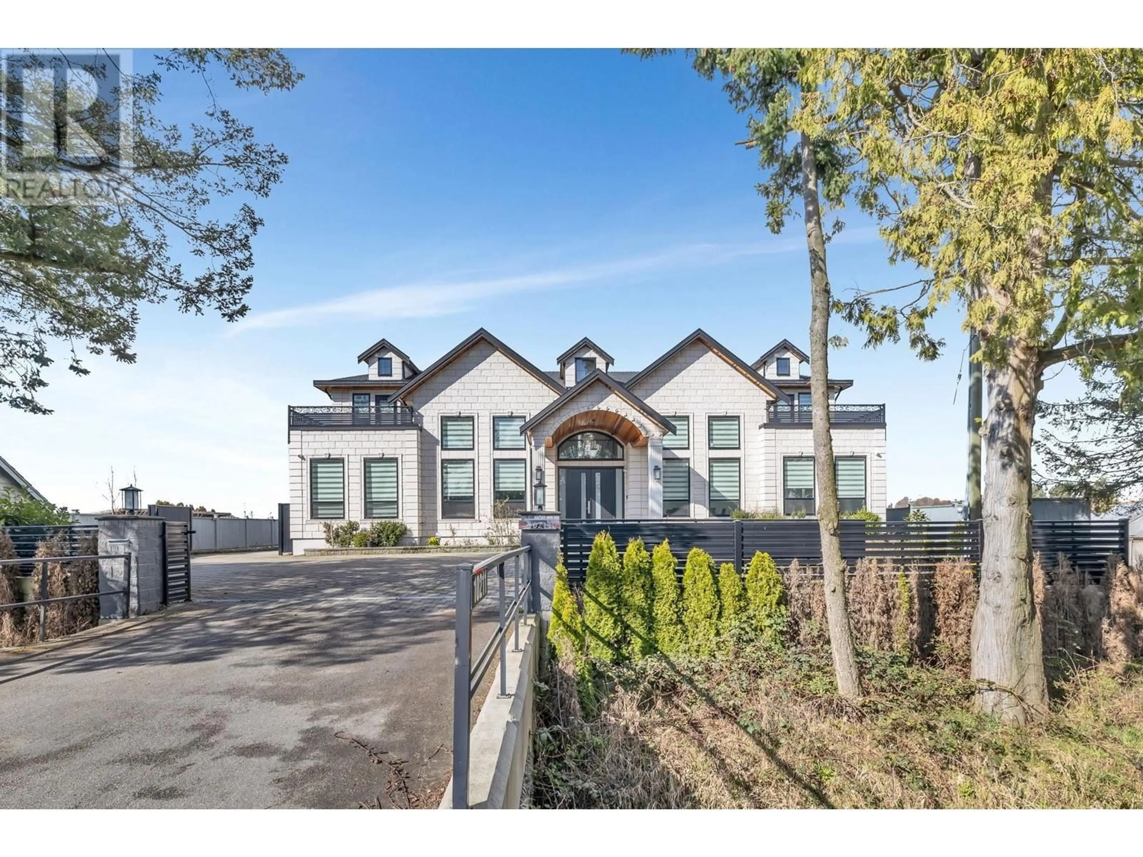 A pic from outside/outdoor area/front of a property/back of a property/a pic from drone, unknown for 10211 NO. 6 ROAD, Richmond British Columbia V6W1E6