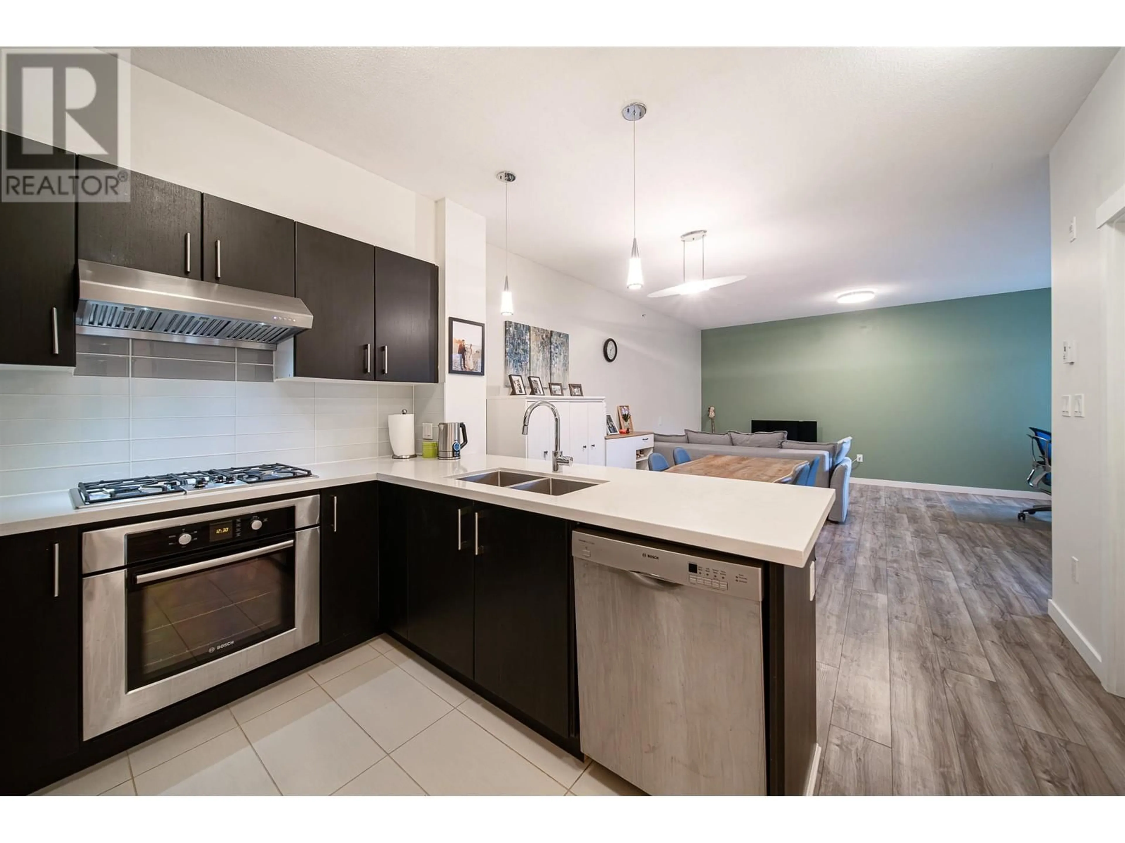 Open concept kitchen, ceramic/tile floor for 419 - 3163 RIVERWALK AVENUE, Vancouver British Columbia V5S0A8