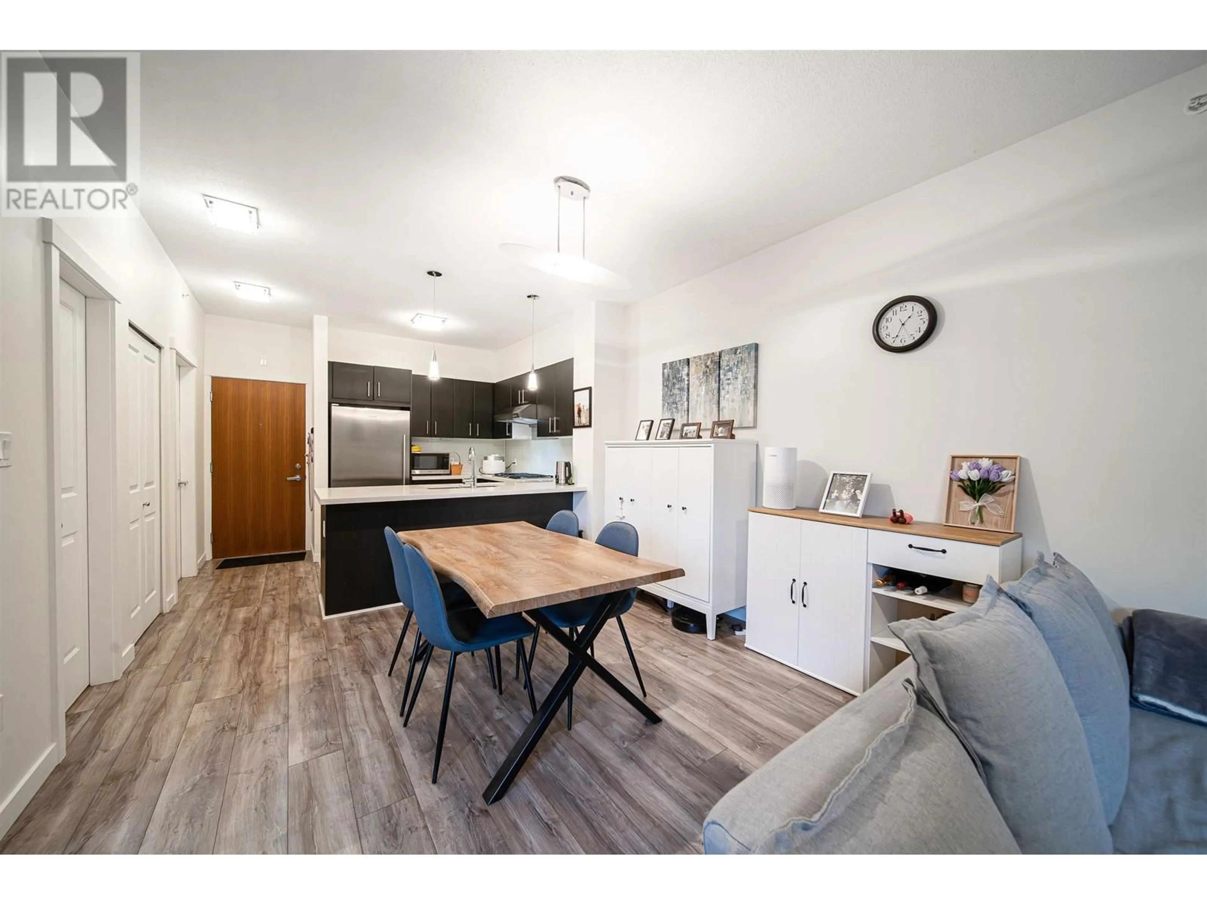Open concept kitchen, wood/laminate floor for 419 - 3163 RIVERWALK AVENUE, Vancouver British Columbia V5S0A8
