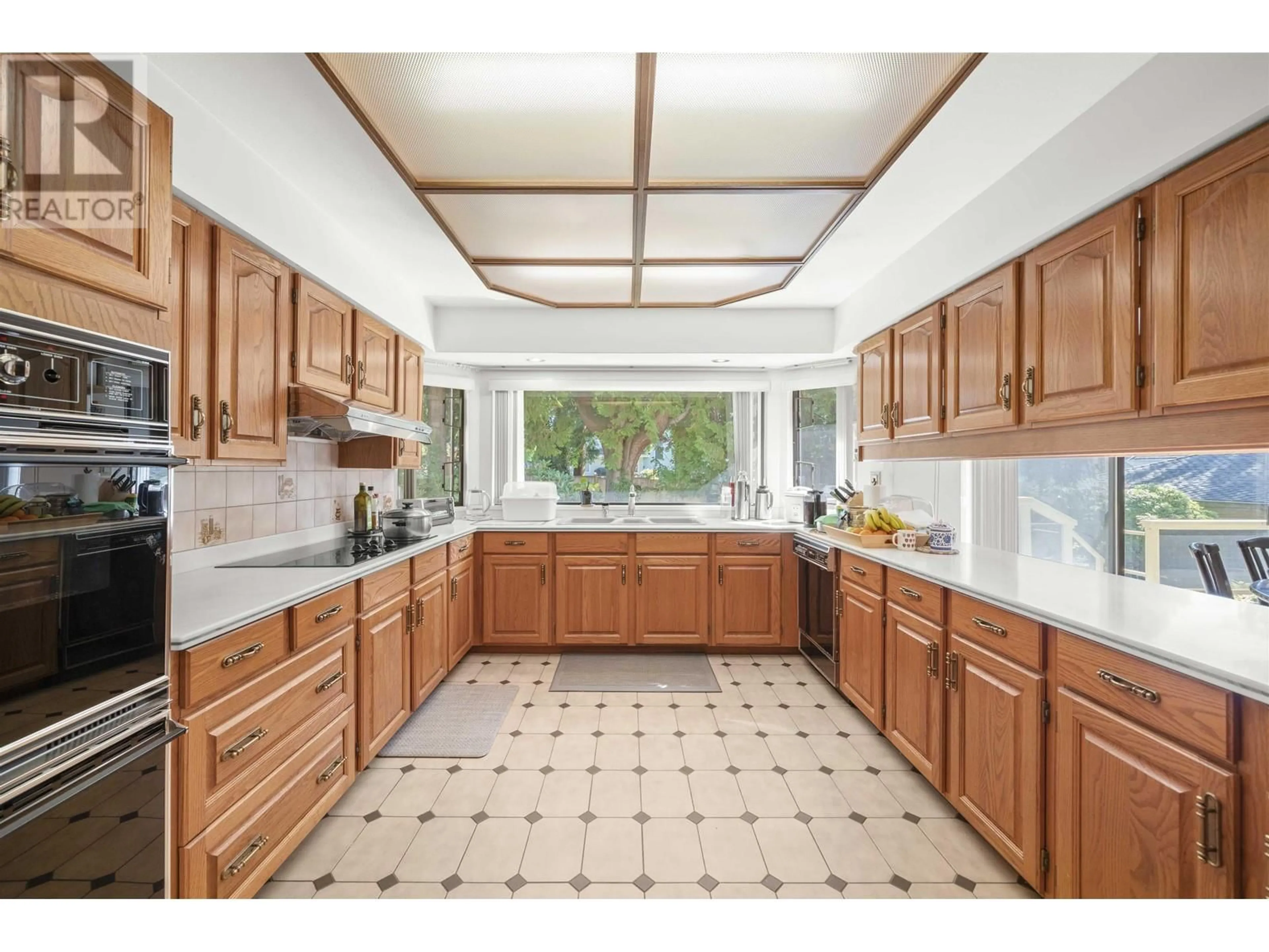 Standard kitchen, ceramic/tile floor for 6668 SELKIRK STREET, Vancouver British Columbia V6P4G8