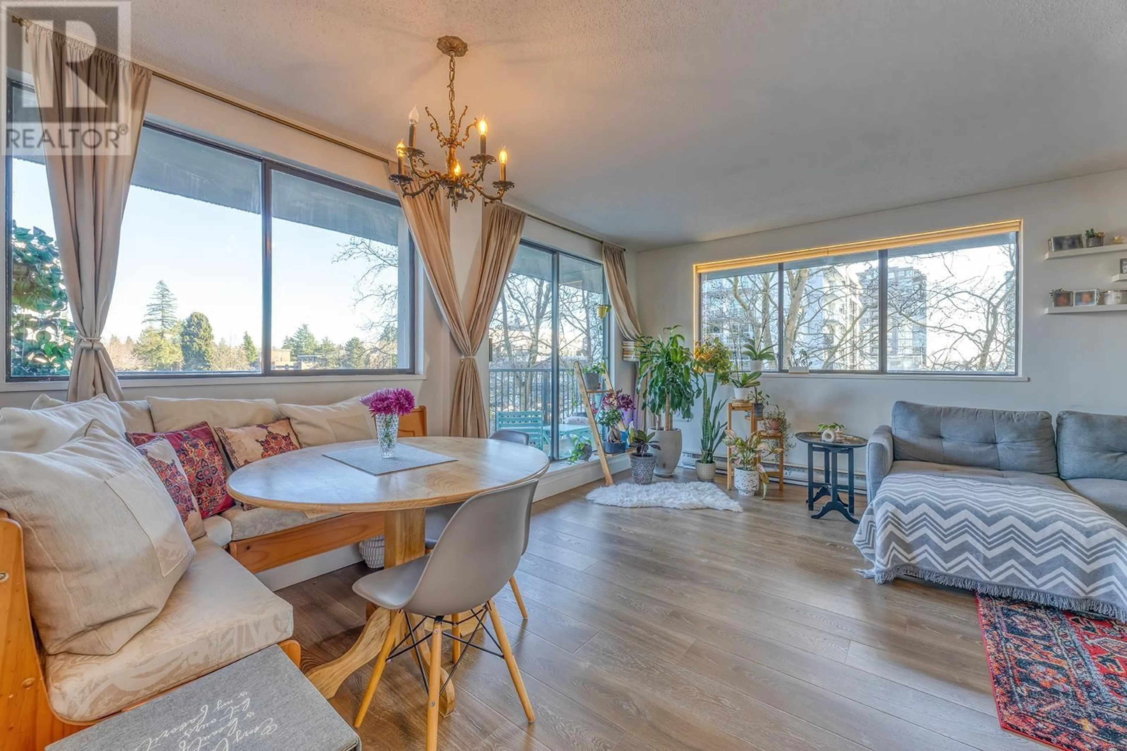 Dining room, wood/laminate floor for 306 - 150 15TH STREET, North Vancouver British Columbia V7L4N9