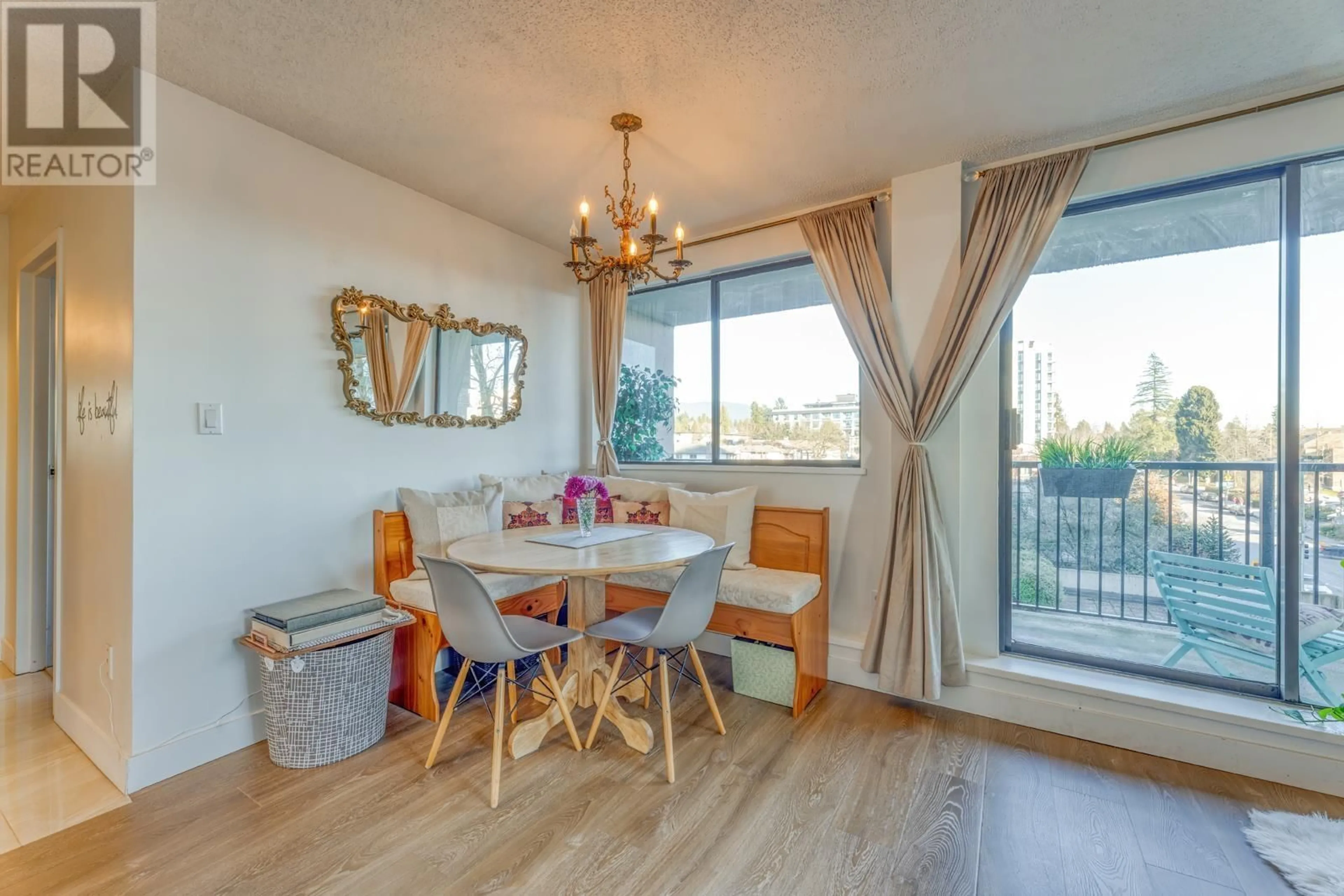 Dining room, wood/laminate floor for 306 - 150 15TH STREET, North Vancouver British Columbia V7L4N9