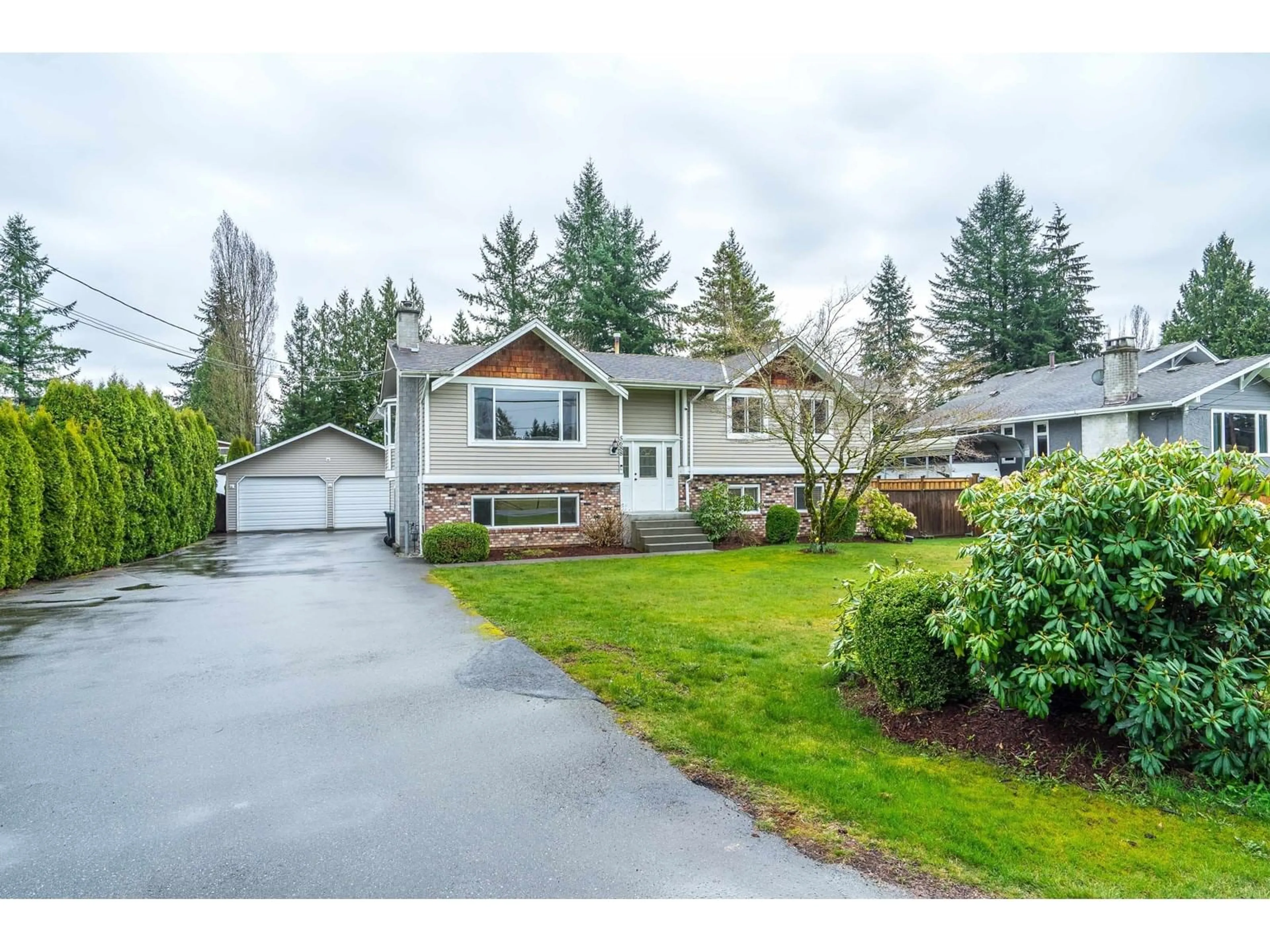 Home with vinyl exterior material, street for 5688 244, Langley British Columbia V2Z1G6