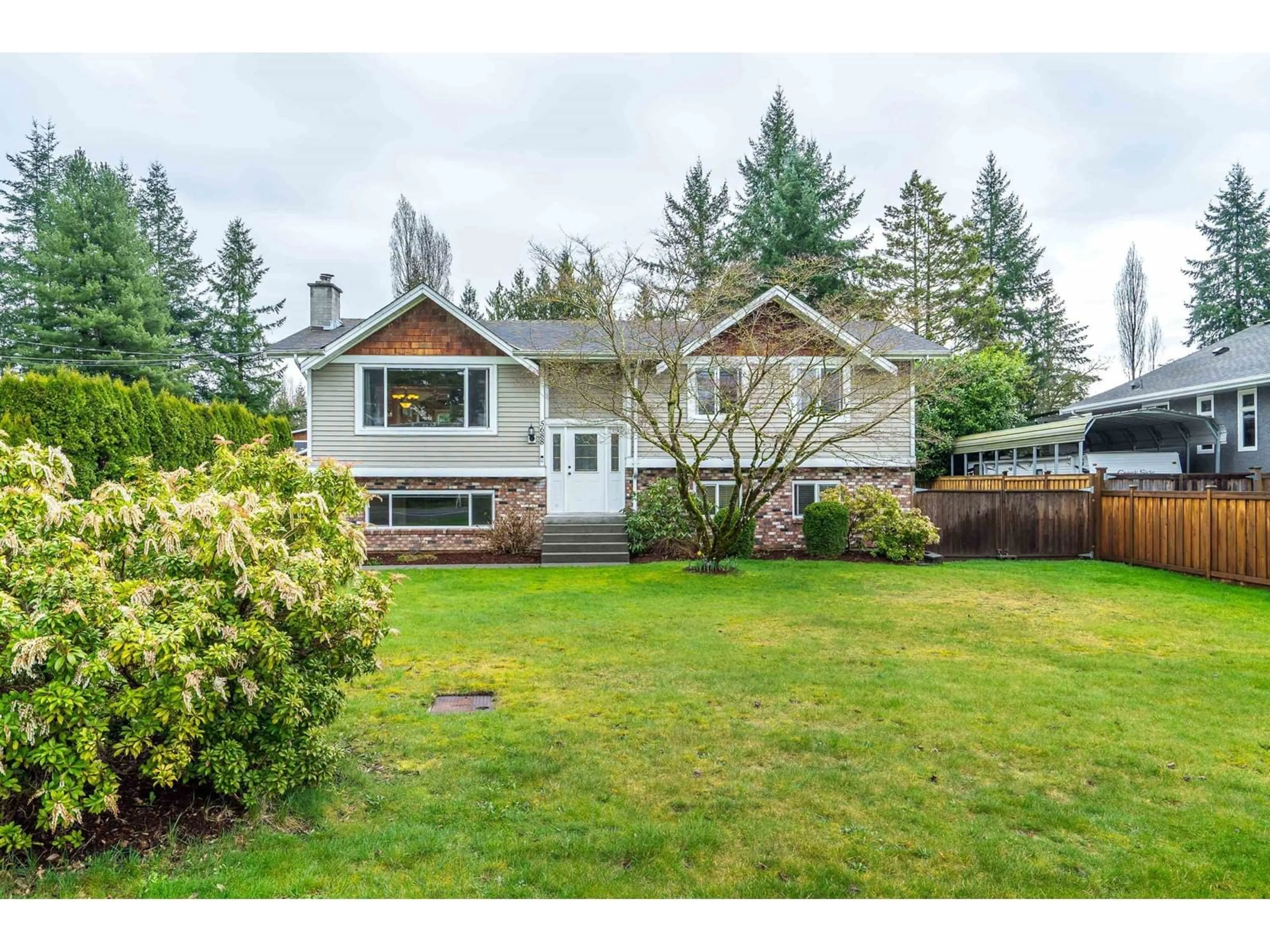 Home with vinyl exterior material, street for 5688 244, Langley British Columbia V2Z1G6