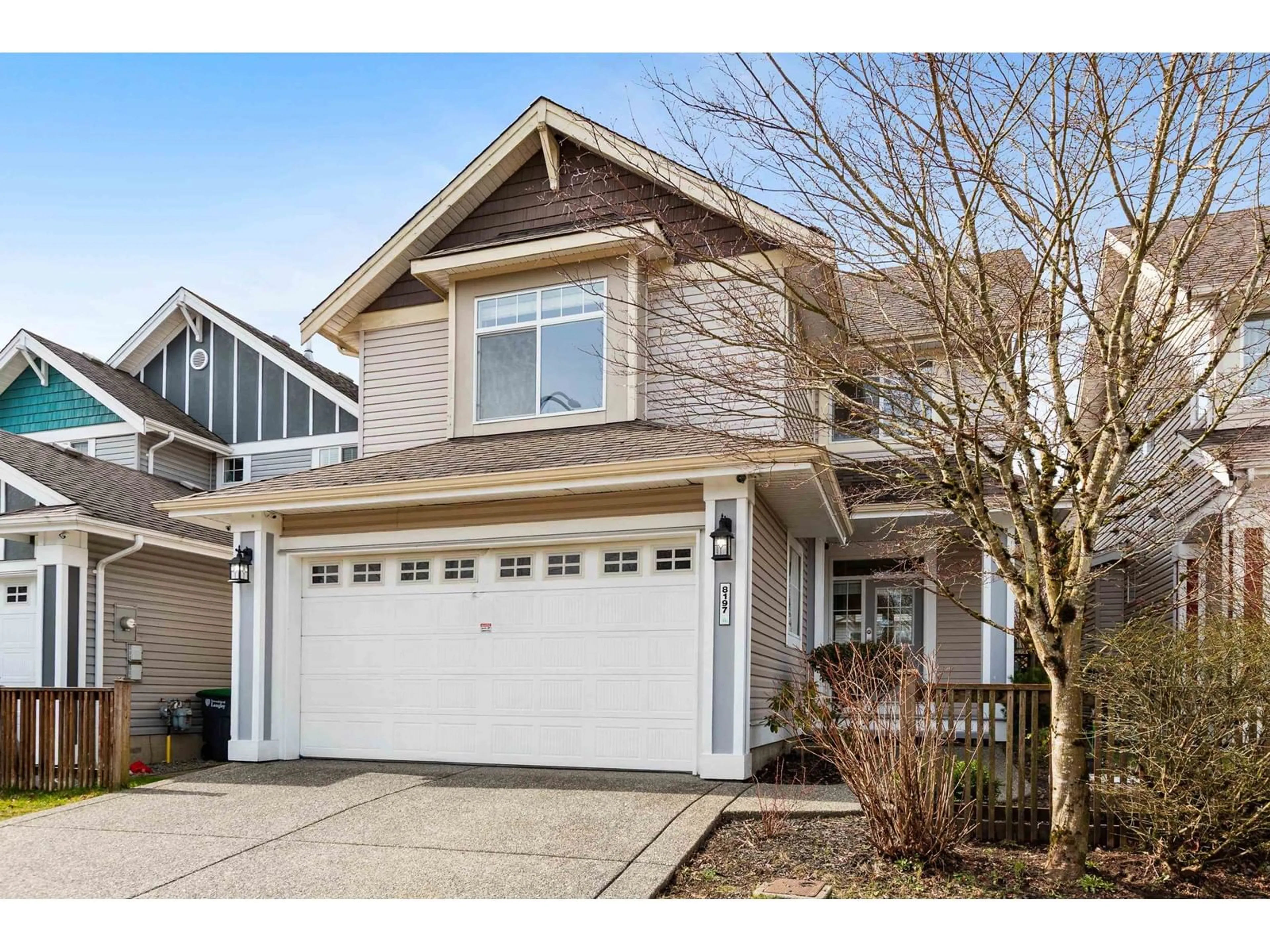 Home with vinyl exterior material, street for 8197 212, Langley British Columbia V2Y2C9