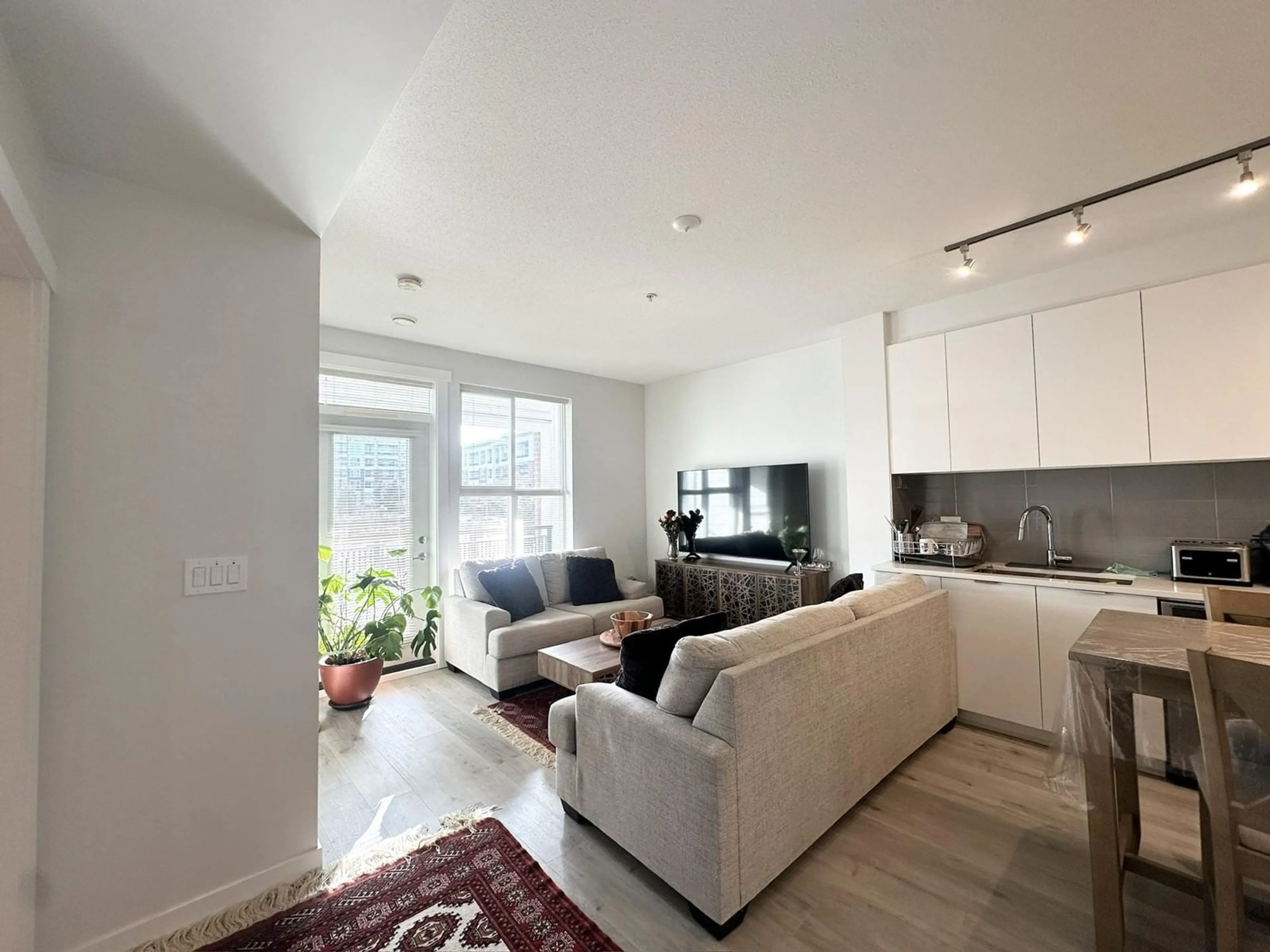 Living room with furniture, unknown for A201 - 8150 207, Langley British Columbia V2Y4J5
