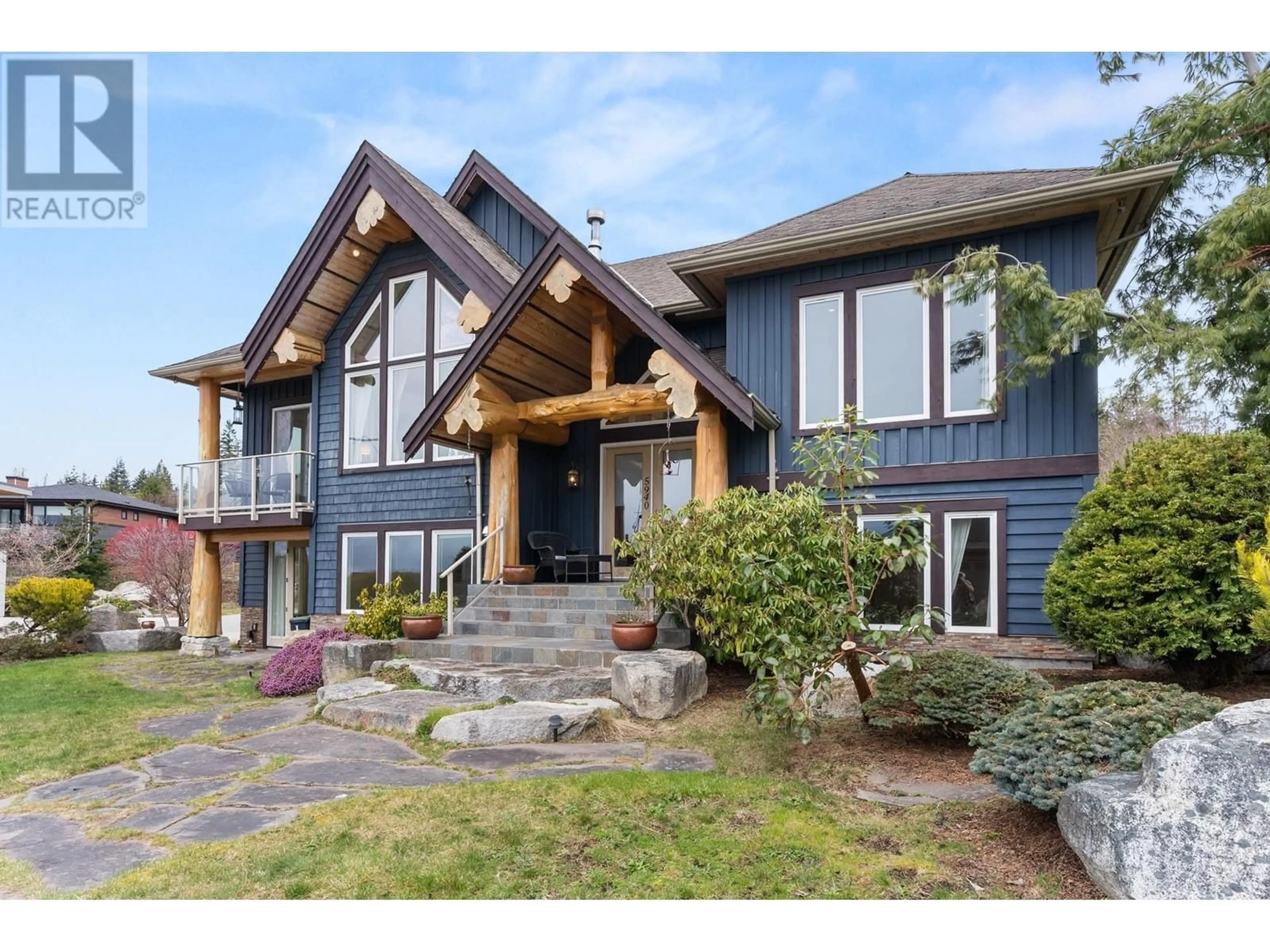 Home with brick exterior material, mountain view for 5940 COWRIE STREET, Sechelt British Columbia V7Z0V1