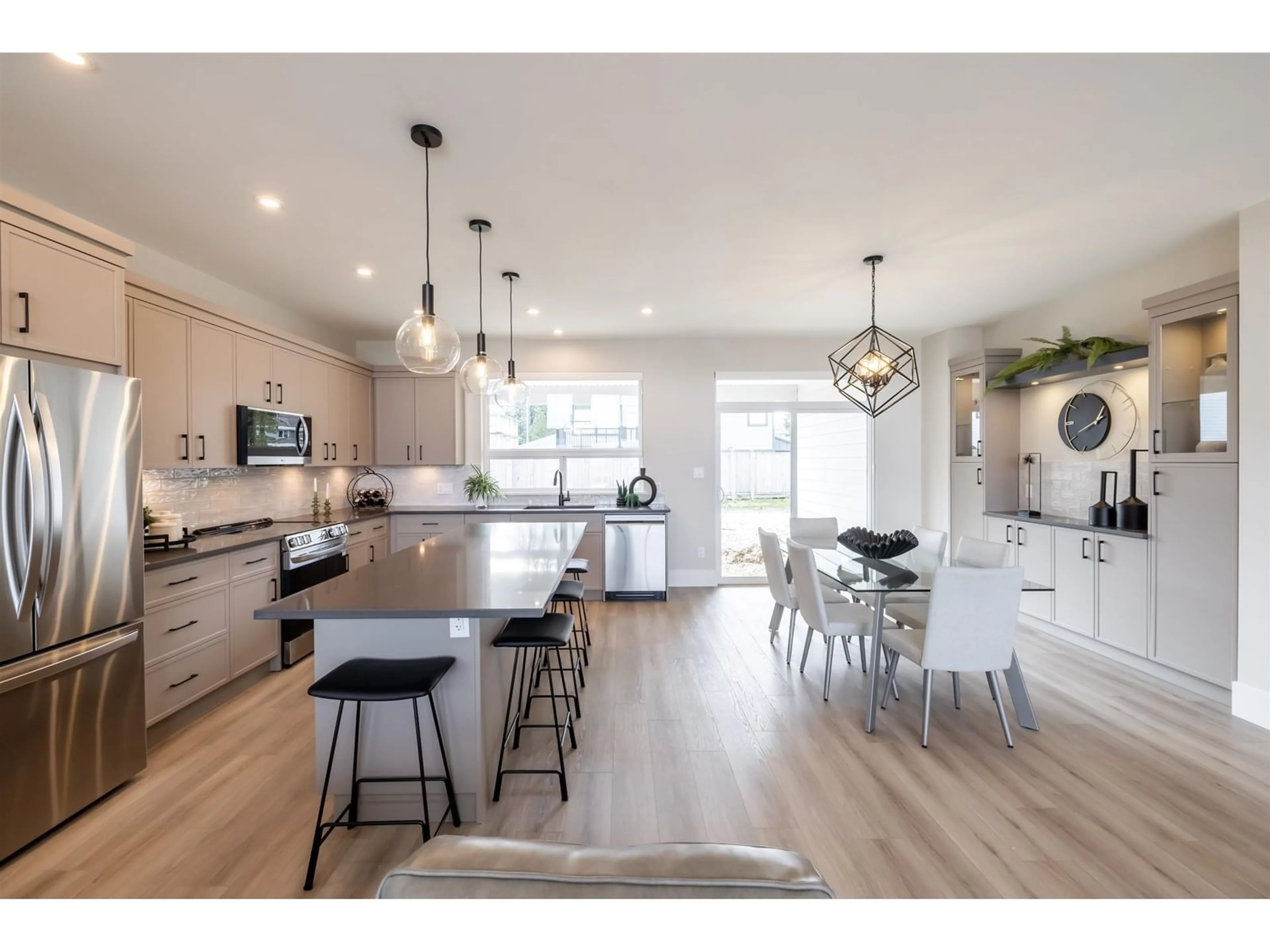 Open concept kitchen, wood/laminate floor for 47280 VALERIE PLACE, Chilliwack British Columbia V2P0K4