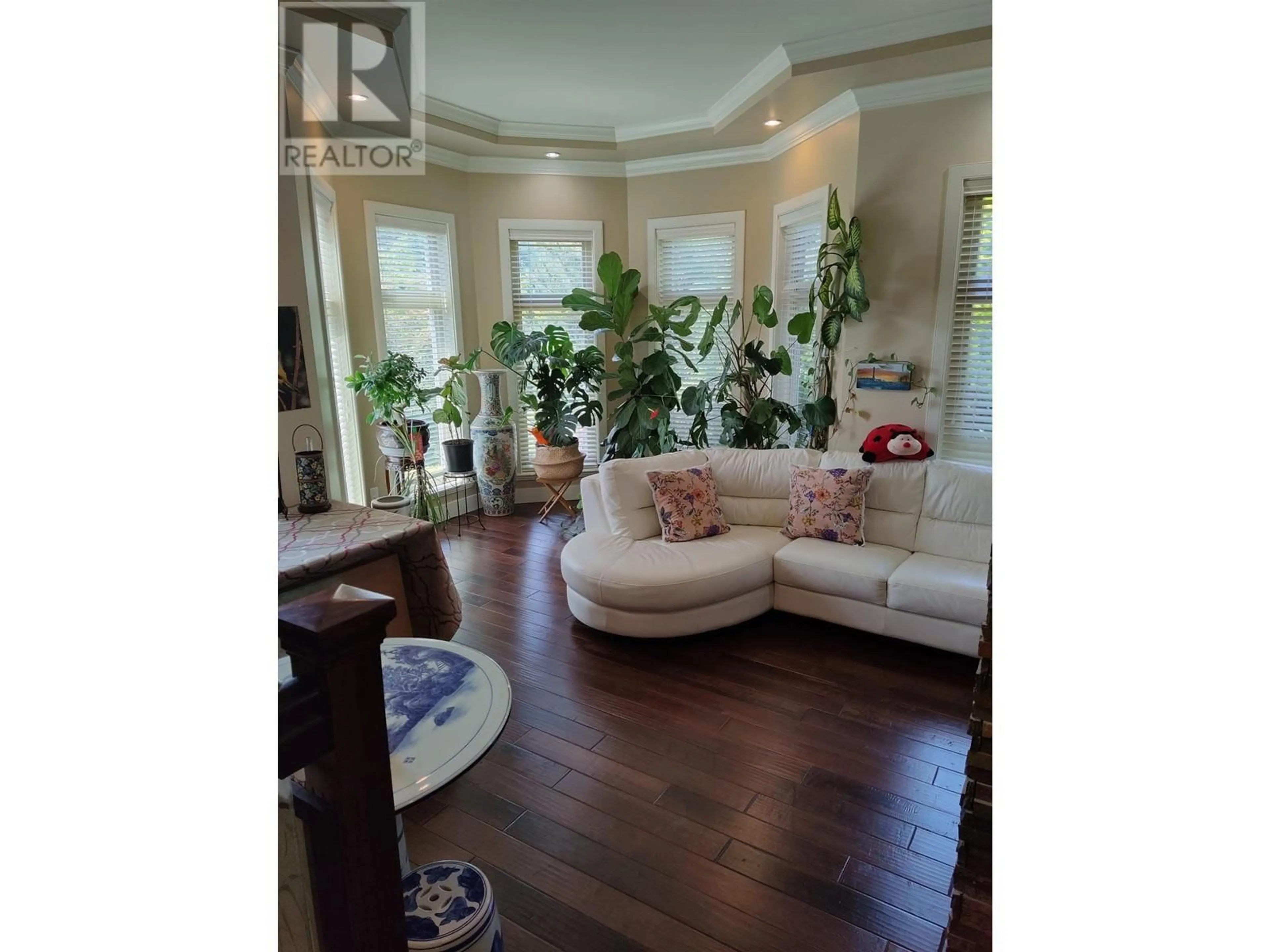 Living room with furniture, wood/laminate floor for 2406 NORCREST COURT, Burnaby British Columbia V3J1C6