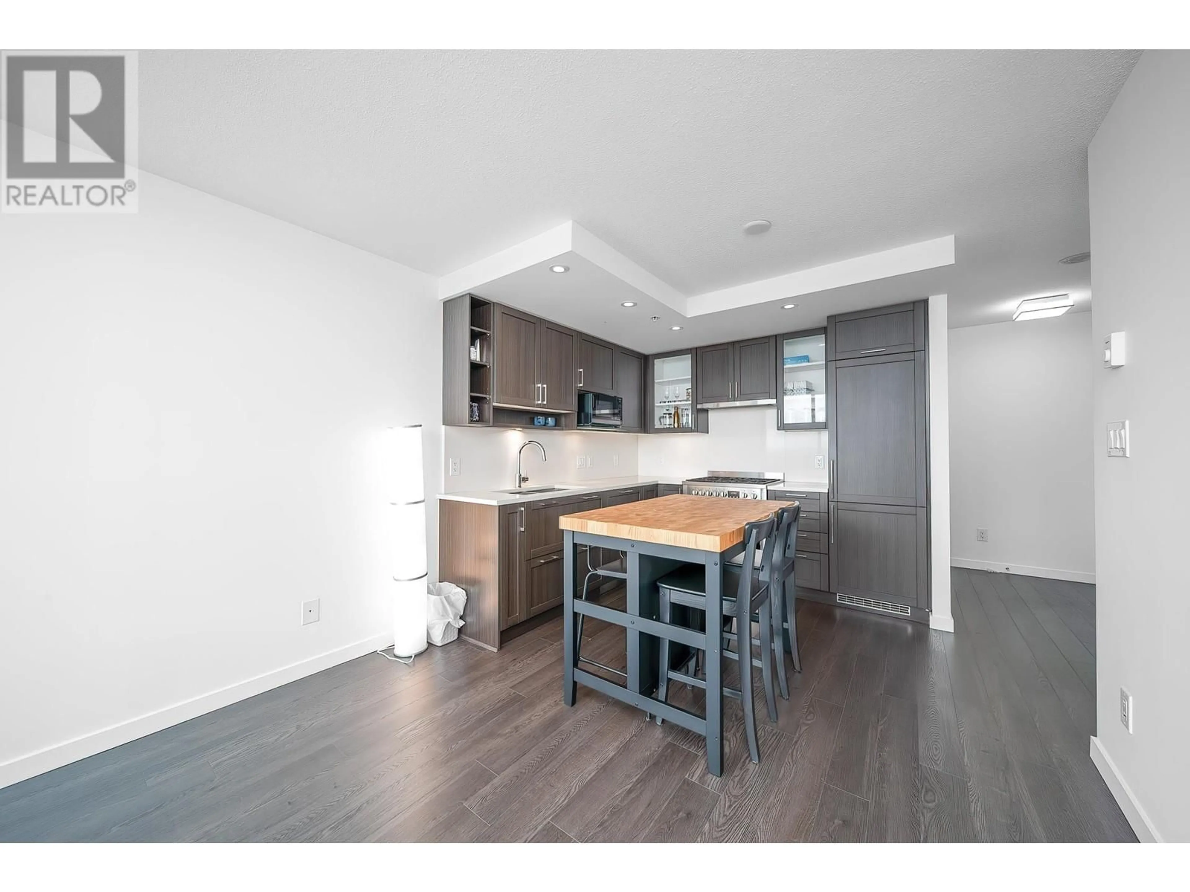 Open concept kitchen, wood/laminate floor for 1610 - 5665 BOUNDARY ROAD, Vancouver British Columbia V5R0E4