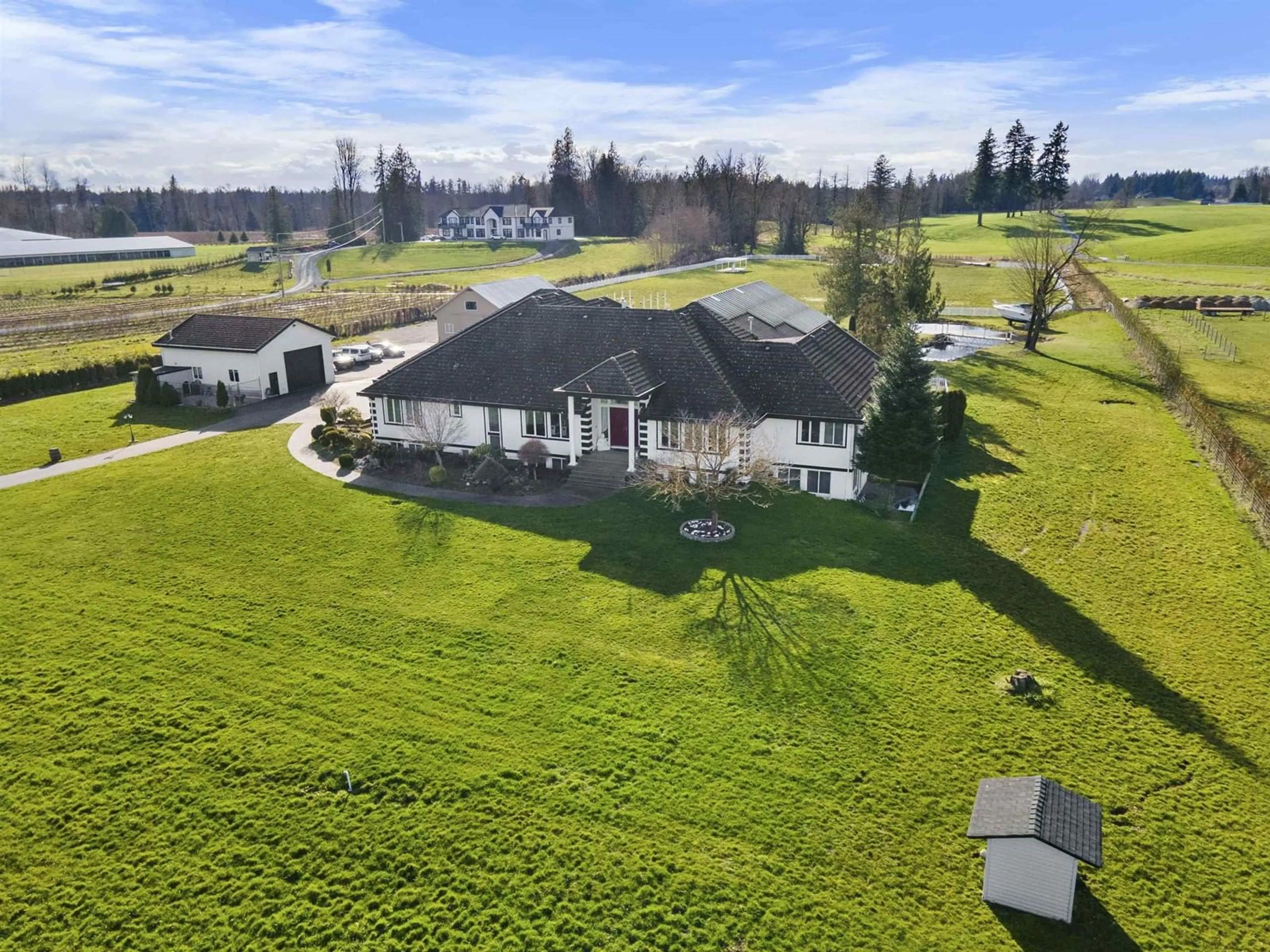 A pic from outside/outdoor area/front of a property/back of a property/a pic from drone, unknown for 667 248, Langley British Columbia V4W2C2