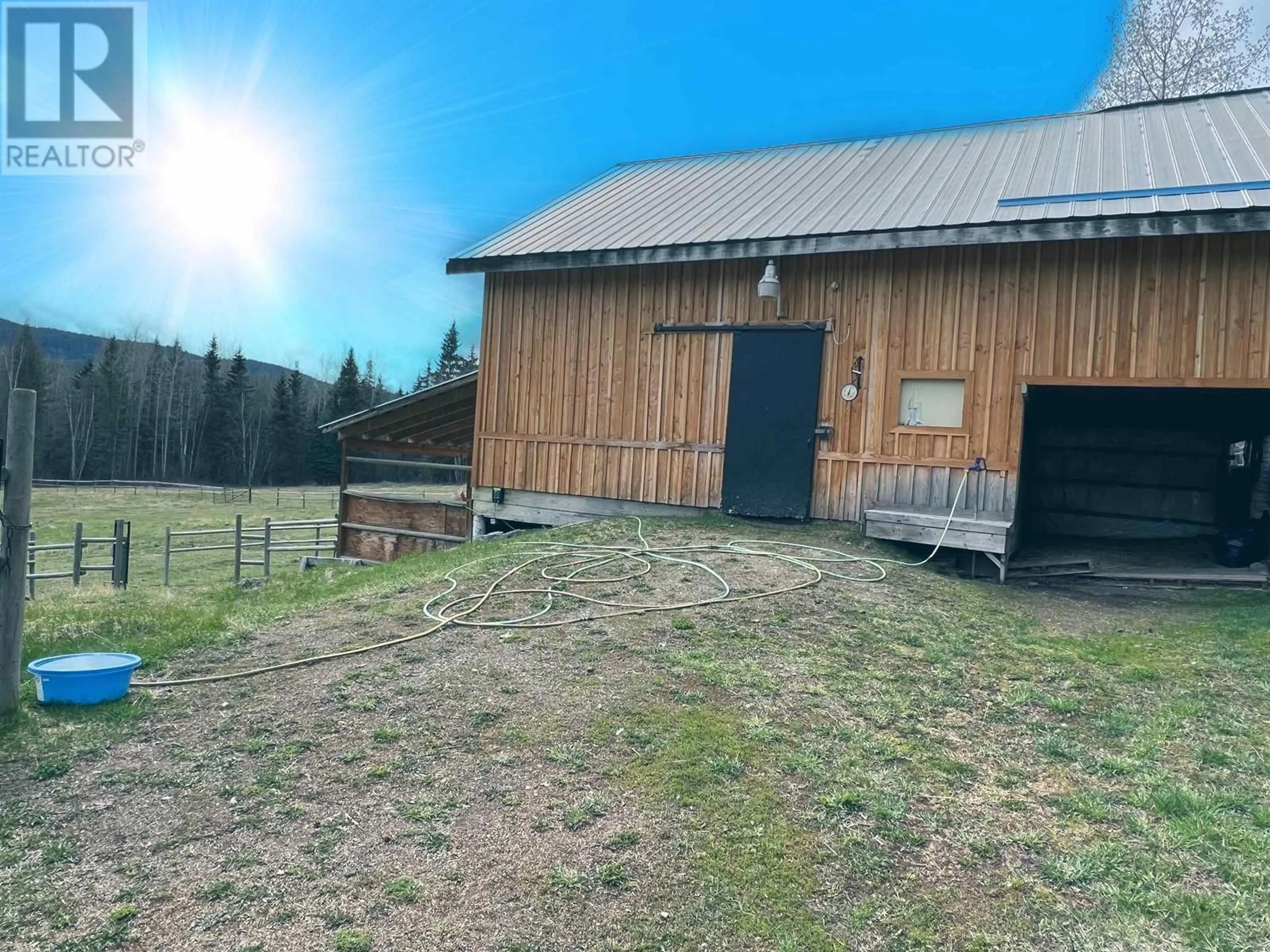 A pic from outside/outdoor area/front of a property/back of a property/a pic from drone, forest/trees view for 7220 SUMMIT DRIVE, Canim Lake British Columbia V0K1J0