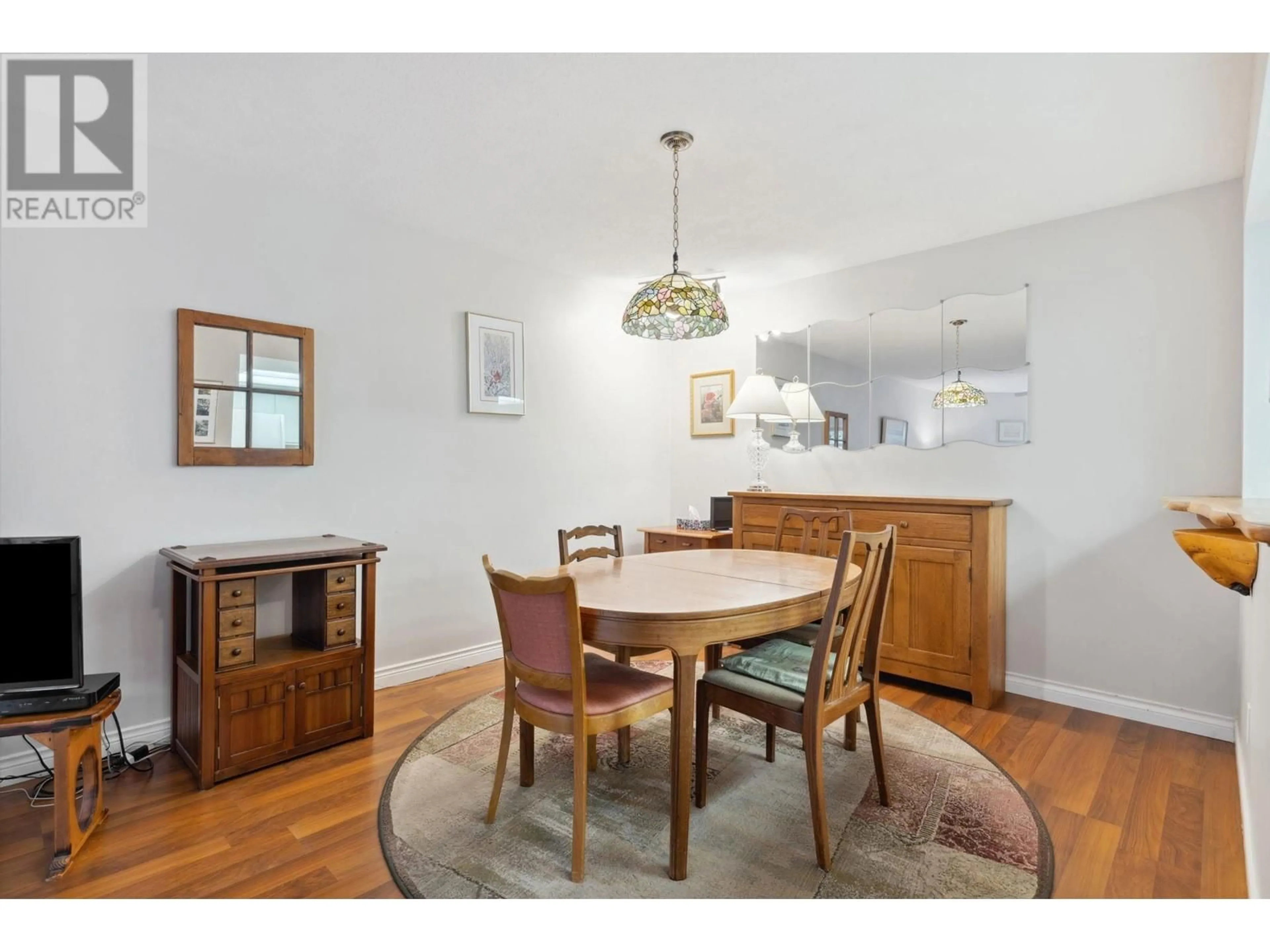 Dining room, wood/laminate floor for 253 - 1440 GARDEN PLACE, Delta British Columbia V4M3Z2