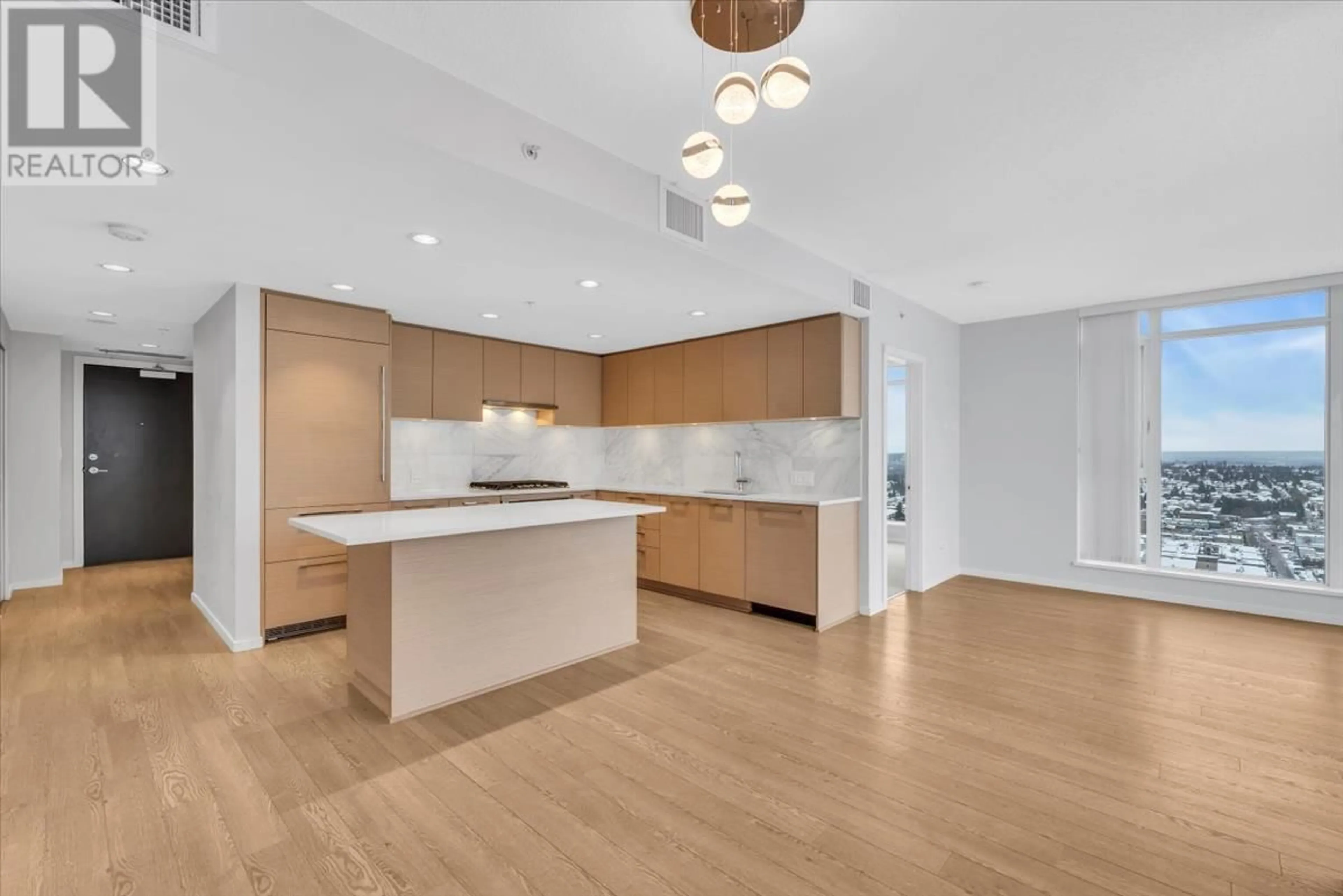 Open concept kitchen, wood/laminate floor for 2608 - 6700 DUNBLANE AVENUE, Burnaby British Columbia V5H0J3