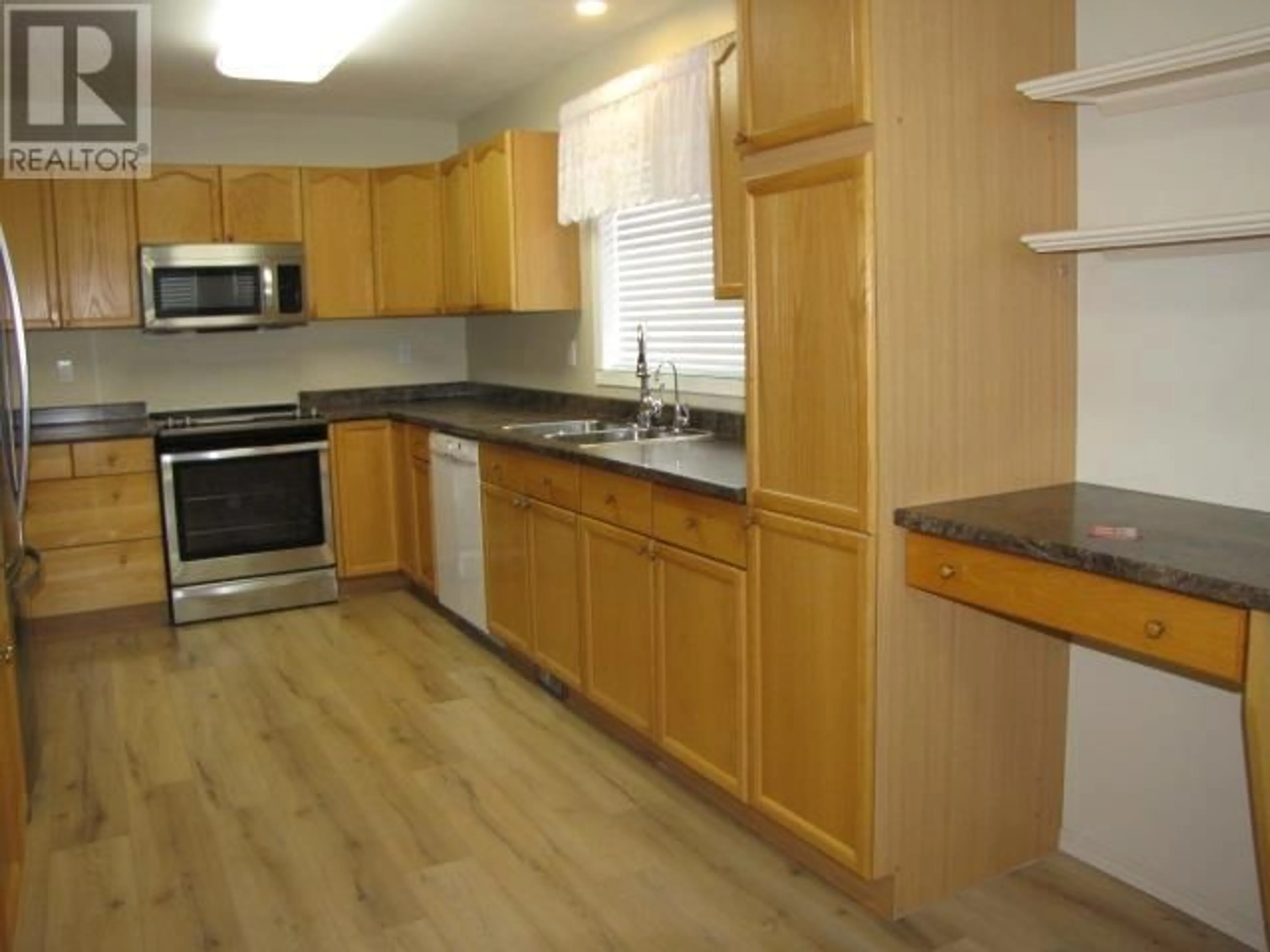 Standard kitchen, wood/laminate floor for 31 - 500 WOTZKE DRIVE, Williams Lake British Columbia V2G4S9