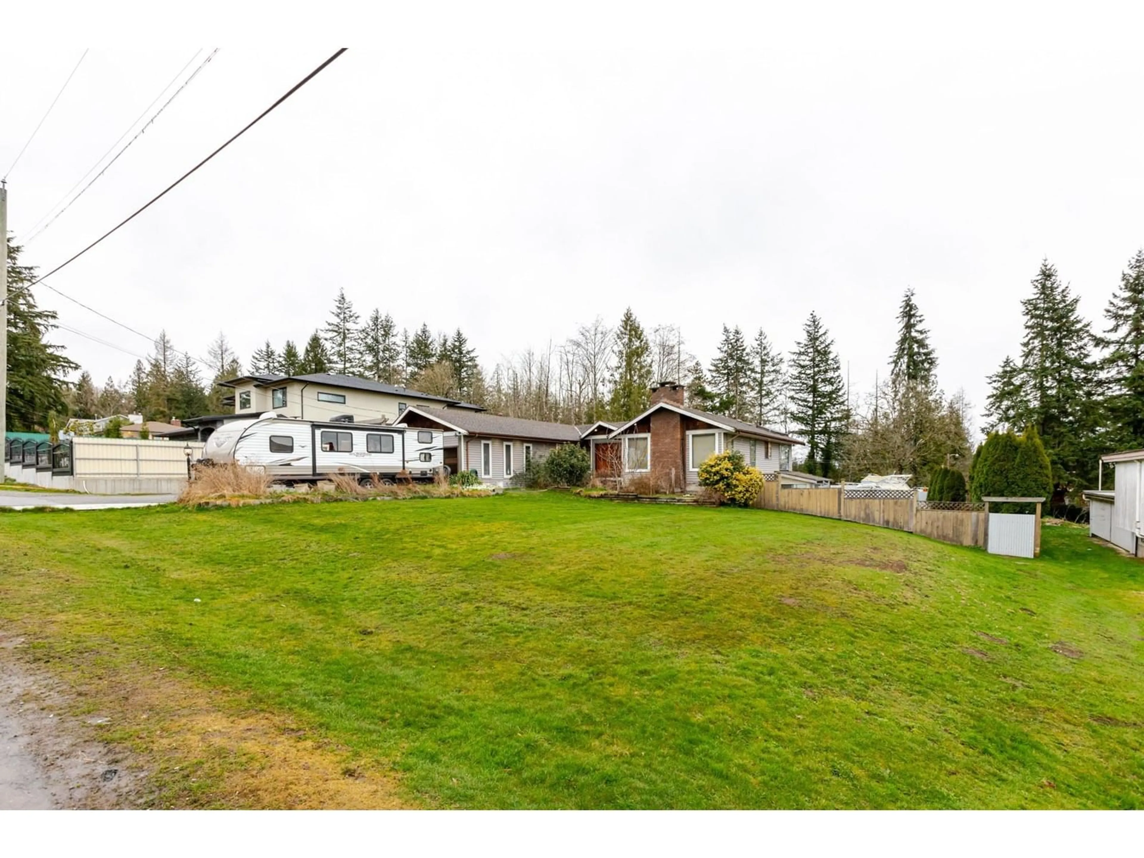 A pic from outside/outdoor area/front of a property/back of a property/a pic from drone, mountain view for 7262 209A, Langley British Columbia V2Y2E4