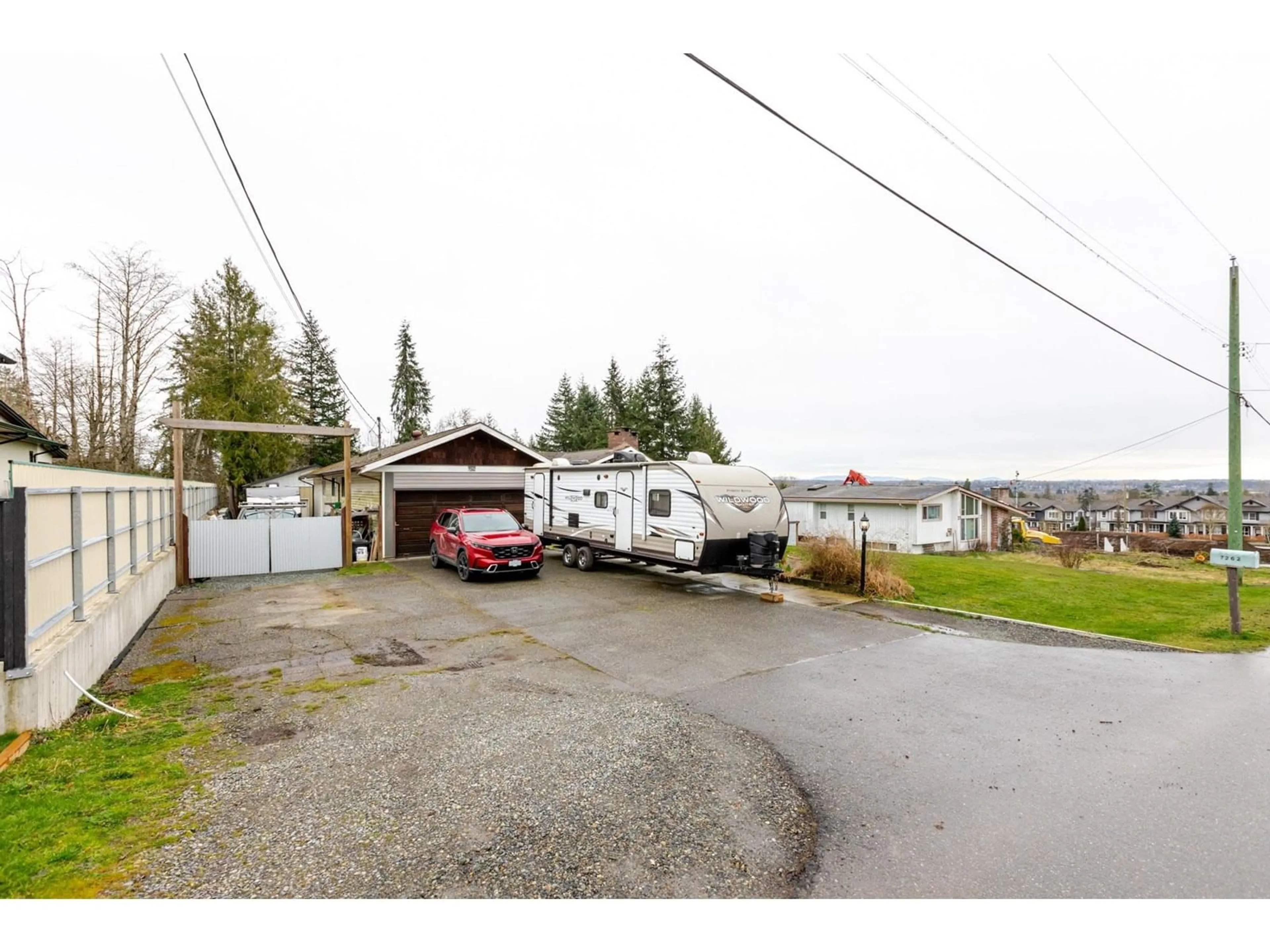 A pic from outside/outdoor area/front of a property/back of a property/a pic from drone, street for 7262 209A, Langley British Columbia V2Y2E4