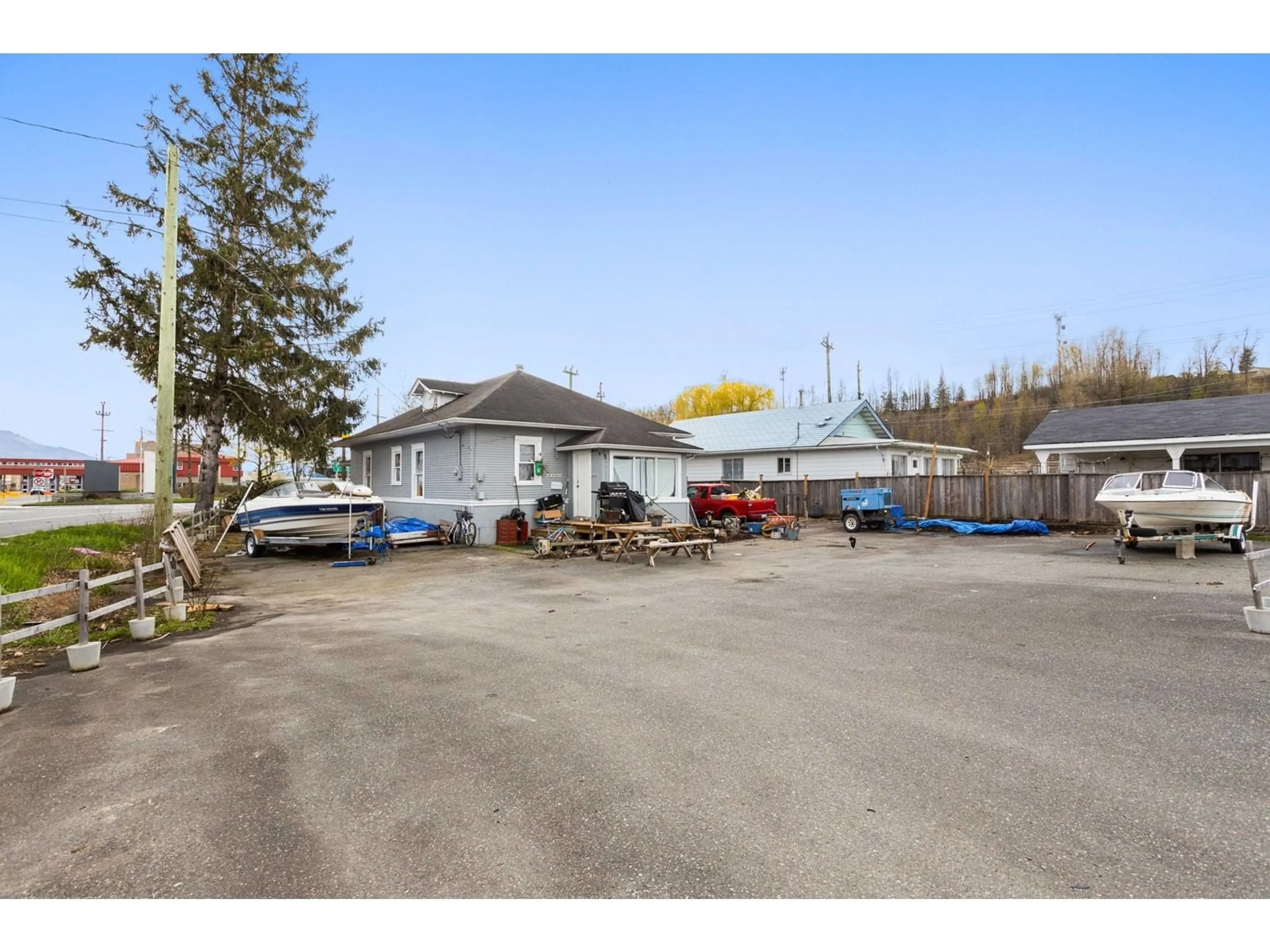 A pic from outside/outdoor area/front of a property/back of a property/a pic from drone, street for 34595 2 AVENUE, Abbotsford British Columbia V2S8B7