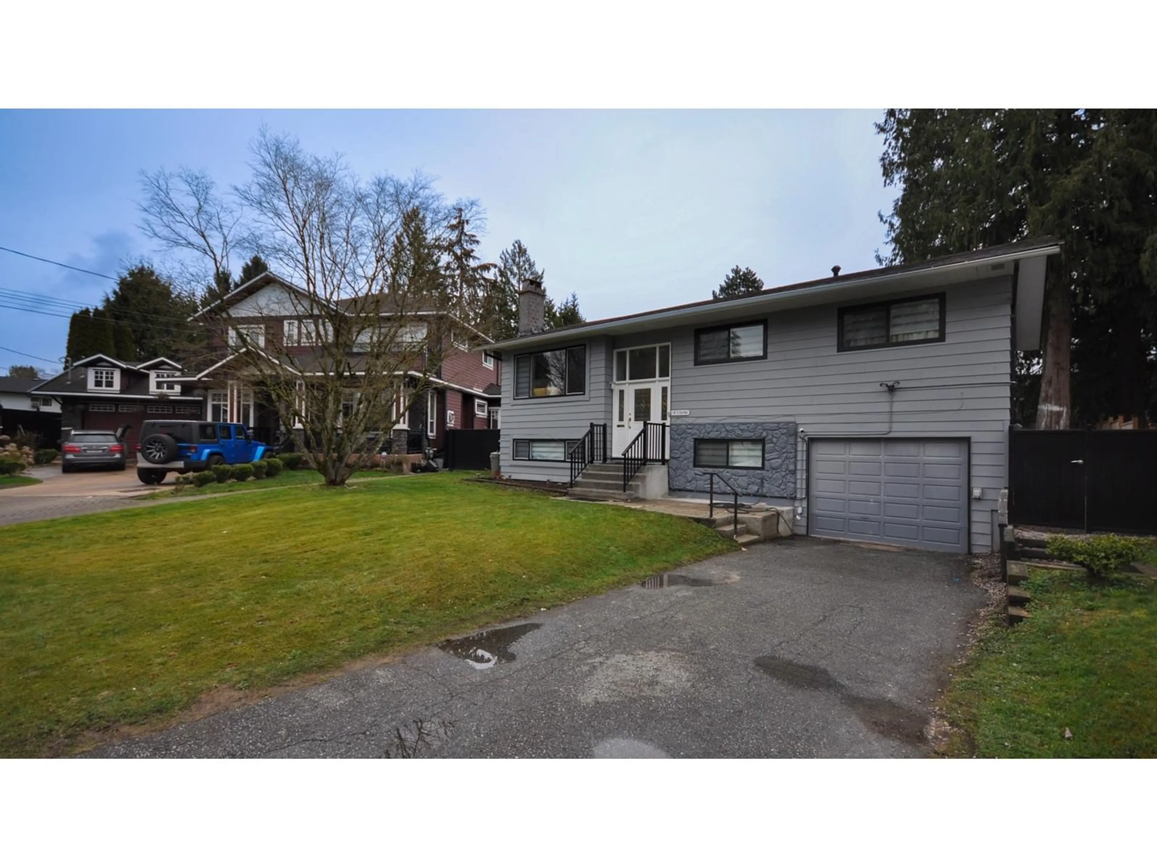 A pic from outside/outdoor area/front of a property/back of a property/a pic from drone, street for 11696 95 AVENUE, Delta British Columbia V4C3T4
