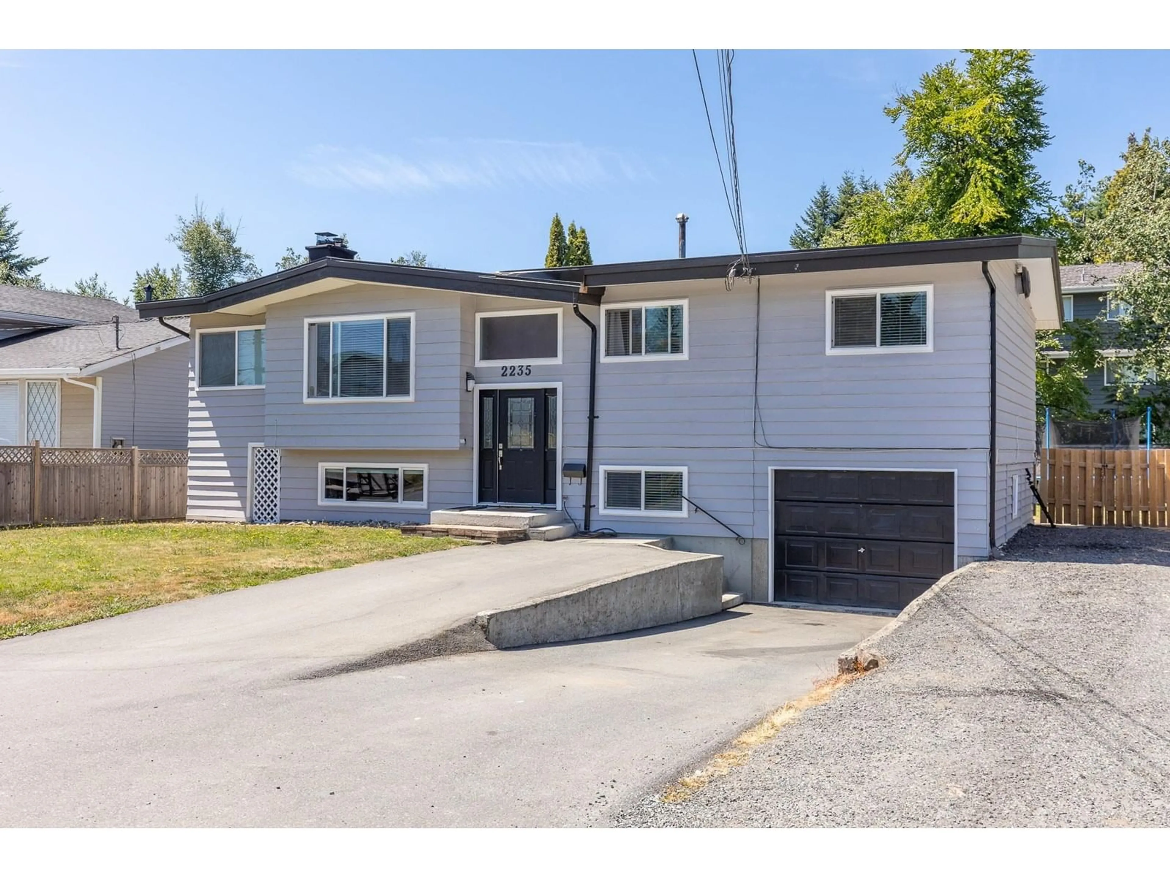 Home with vinyl exterior material, street for 2235 BROADWAY STREET, Abbotsford British Columbia V2T3G6