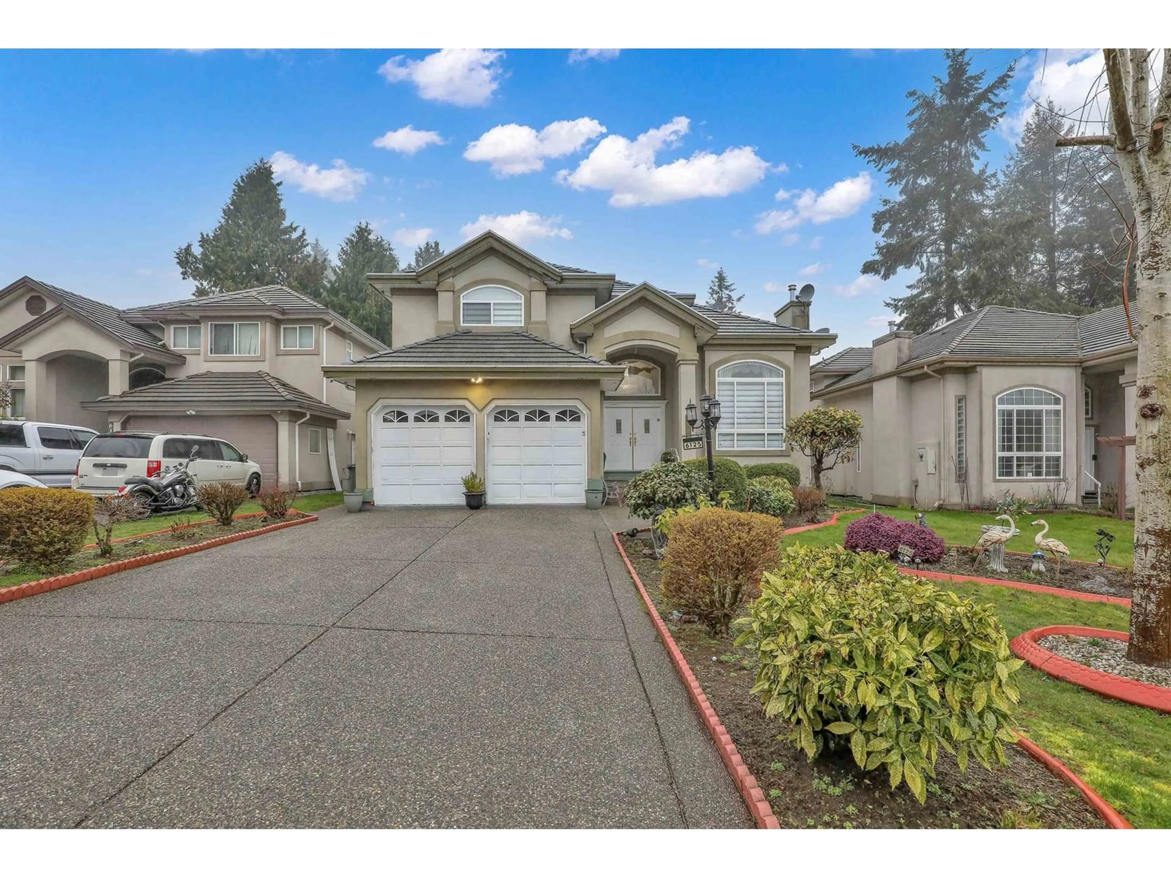 Home with vinyl exterior material, street for 6125 132A, Surrey British Columbia V3X3J6