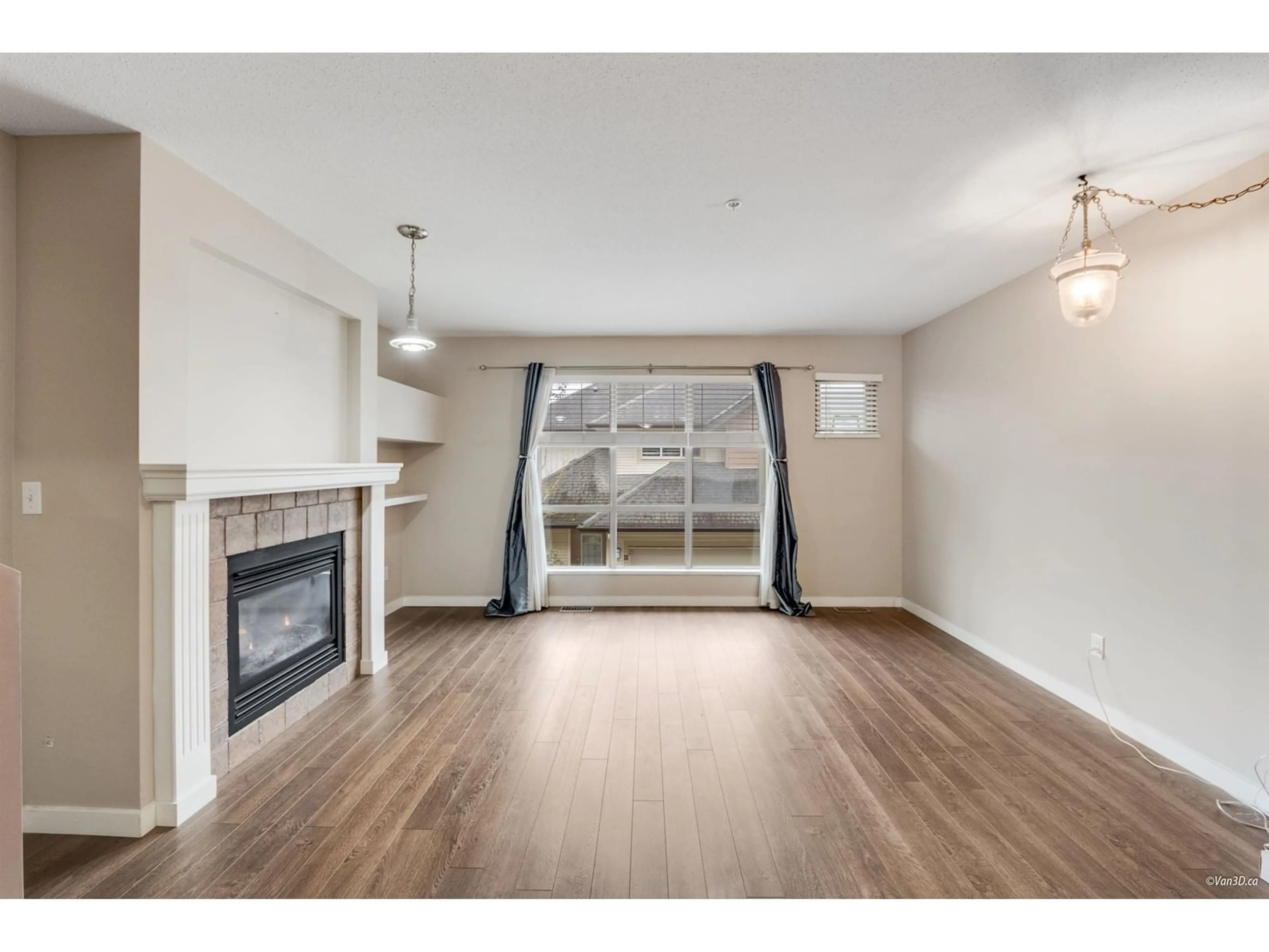 Living room with furniture, wood/laminate floor for 19 - 20350 68, Langley British Columbia V2Y3A5