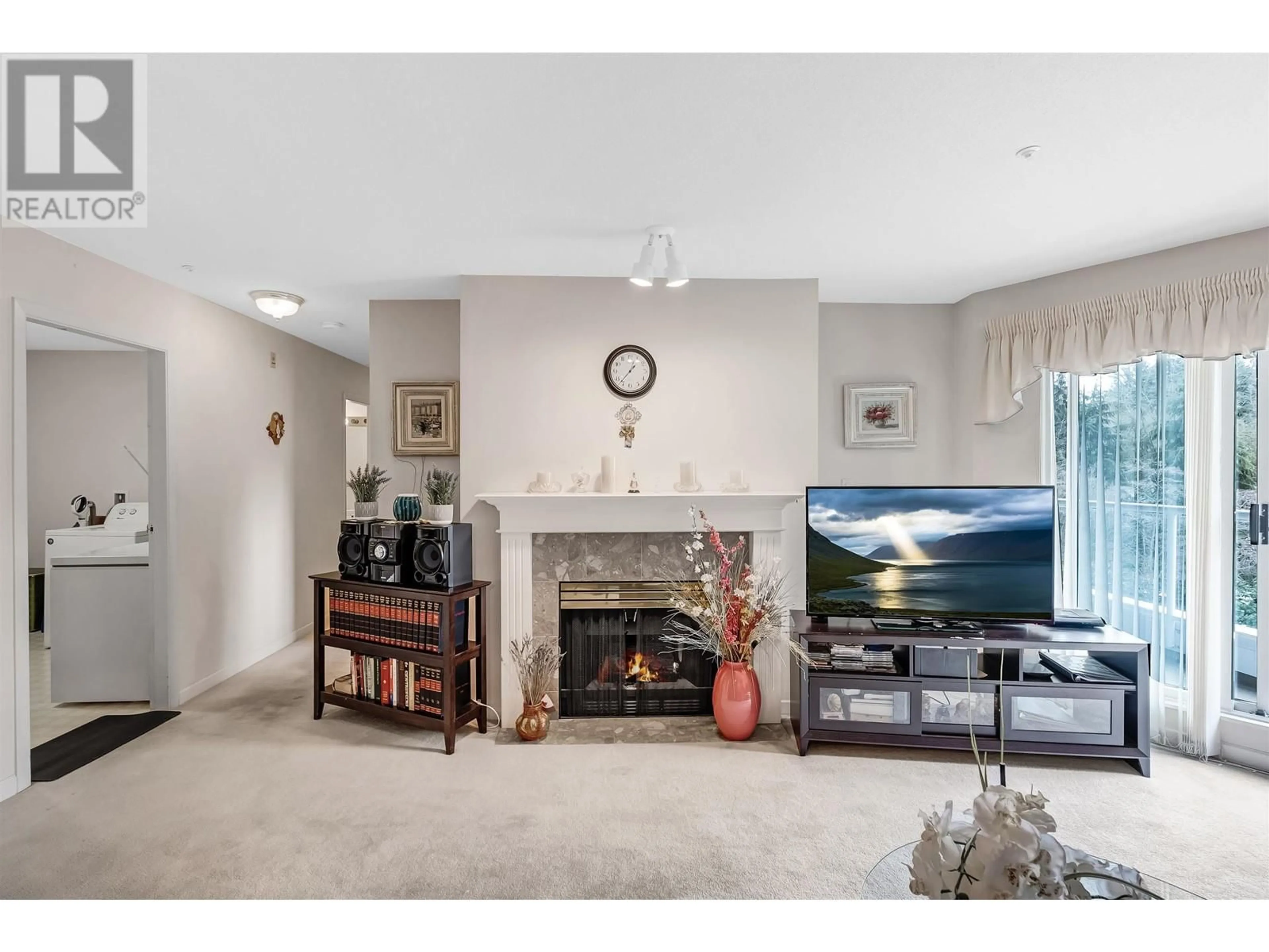 Living room with furniture, unknown for 312 - 2020 CEDAR VILLAGE CRESCENT, North Vancouver British Columbia V7J3P5