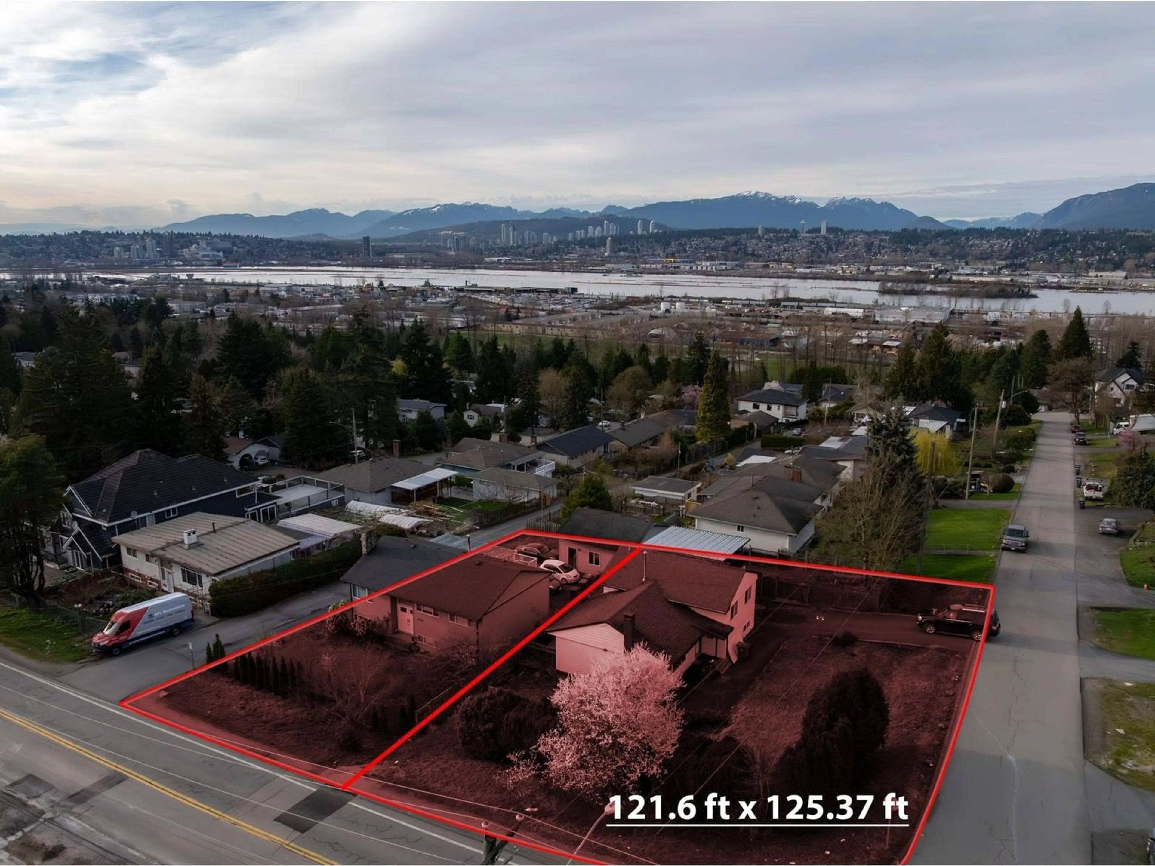 A pic from outside/outdoor area/front of a property/back of a property/a pic from drone, water/lake/river/ocean view for 11219 135A, Surrey British Columbia V3R3A8